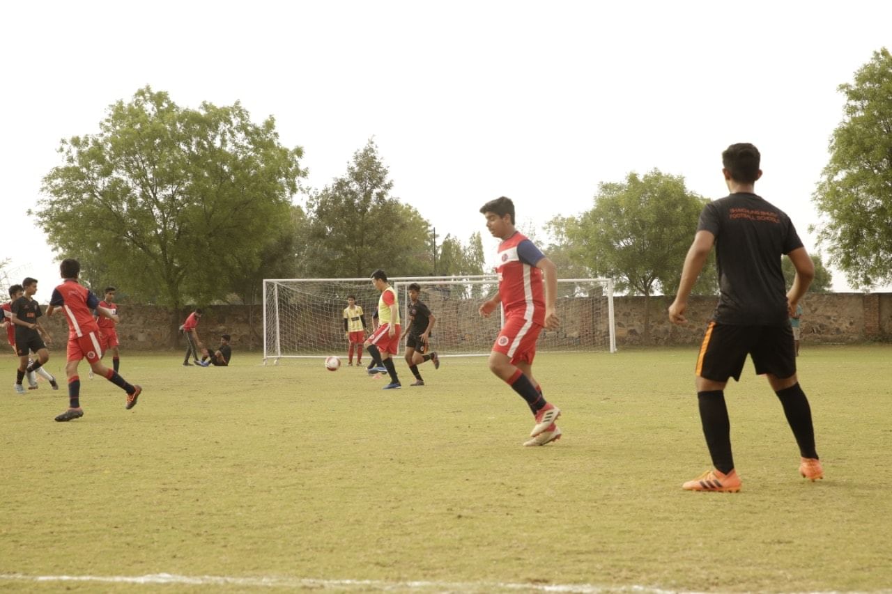 Player,Team sport,Football player,Sports,Ball game,Tournament,Sports equipment,Competition event,Soccer,Football