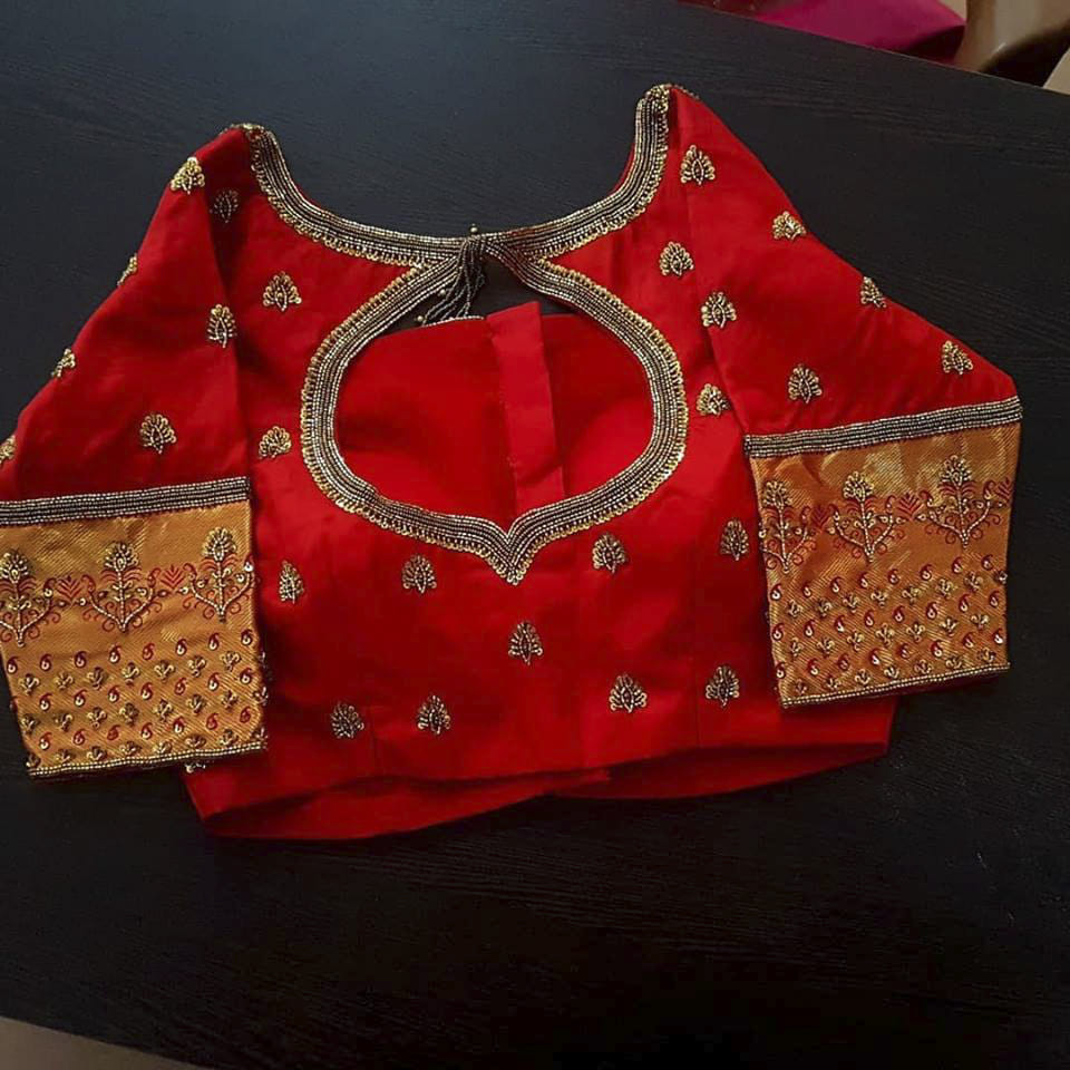 Red,Handbag,Bag,Fashion,Orange,Fashion accessory,Shoulder bag,Material property,Outerwear,Pattern