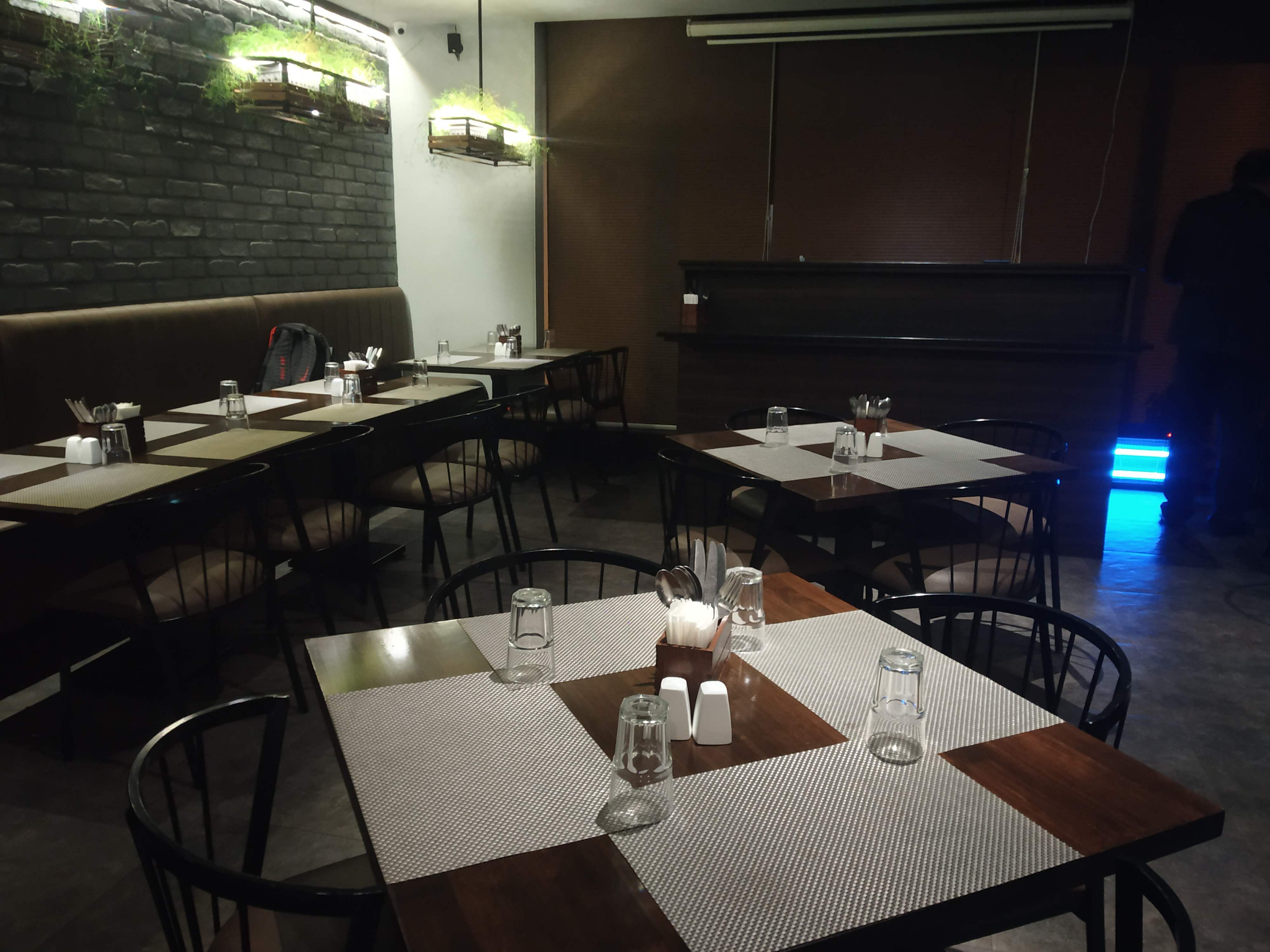 Restaurant,Table,Room,Architecture,Interior design,Atmosphere,Building,Meal,Furniture,Night