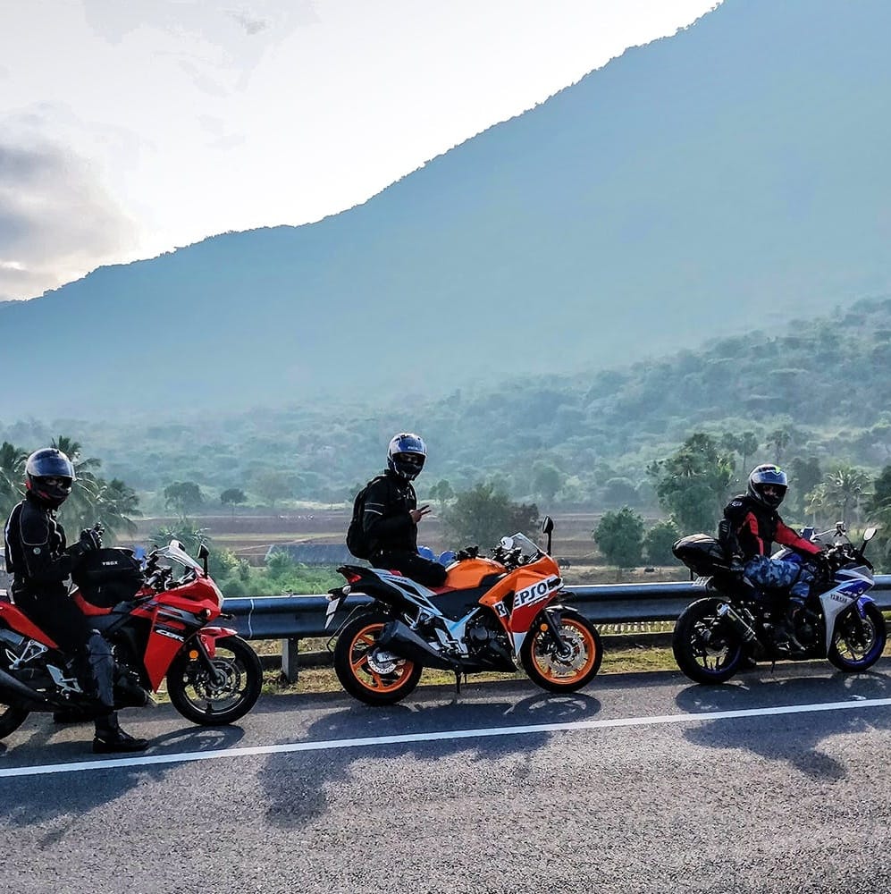 Land vehicle,Vehicle,Motorcycle,Motorcycling,Sky,Mountainous landforms,Mountain,Mountain range,Cloud,Adventure game