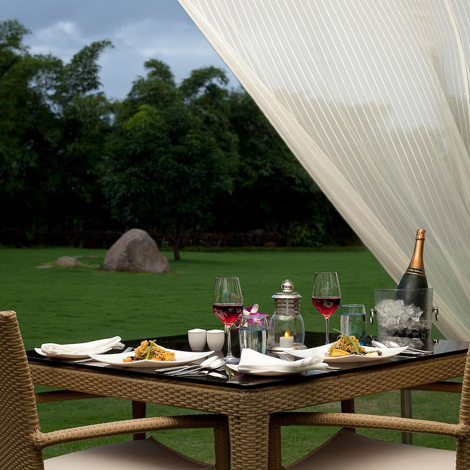 Property,Table,Furniture,Shade,Patio,Room,Canopy,Tent,Outdoor furniture,Interior design