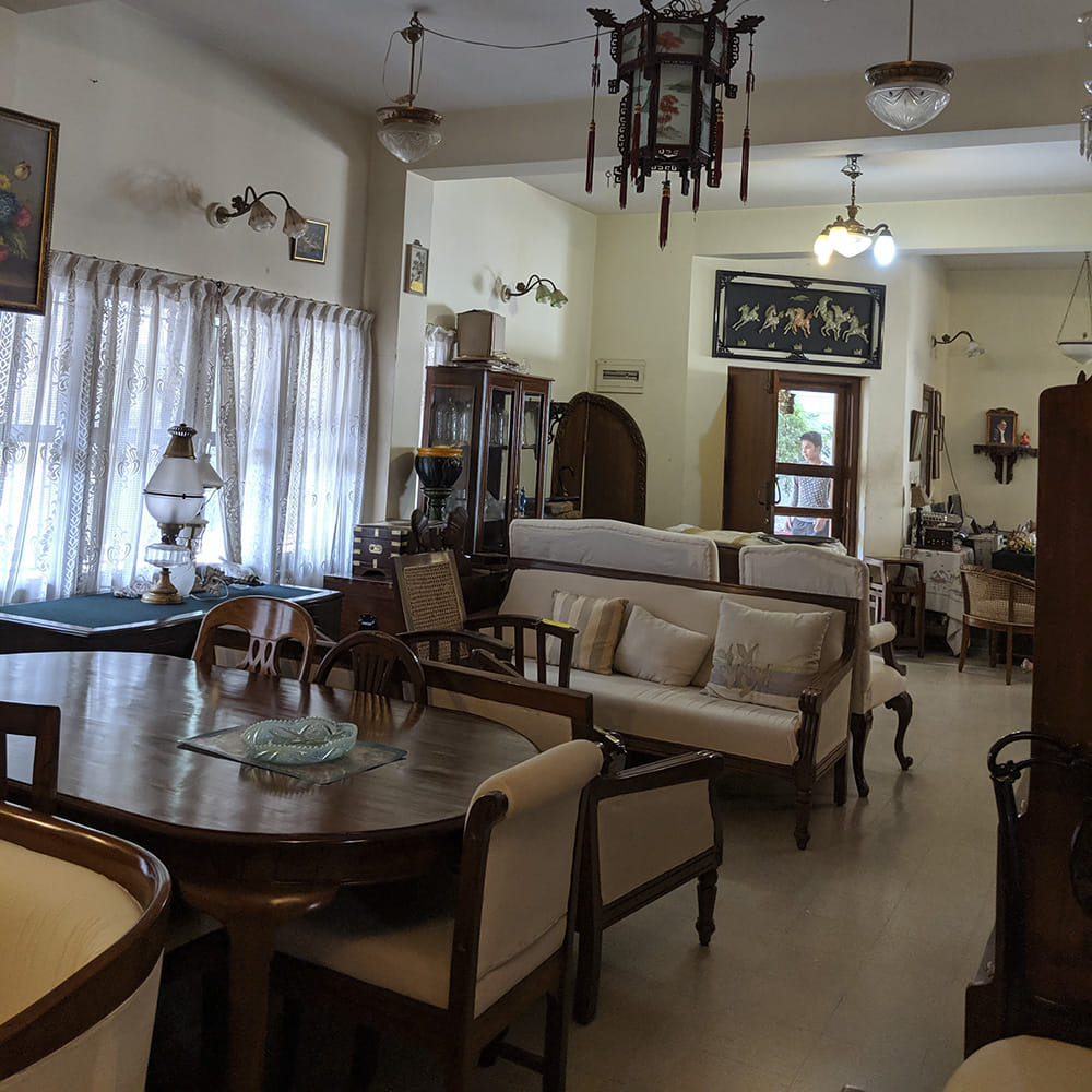 Room,Furniture,Interior design,Living room,Property,Building,Table,Ceiling,Home,Real estate