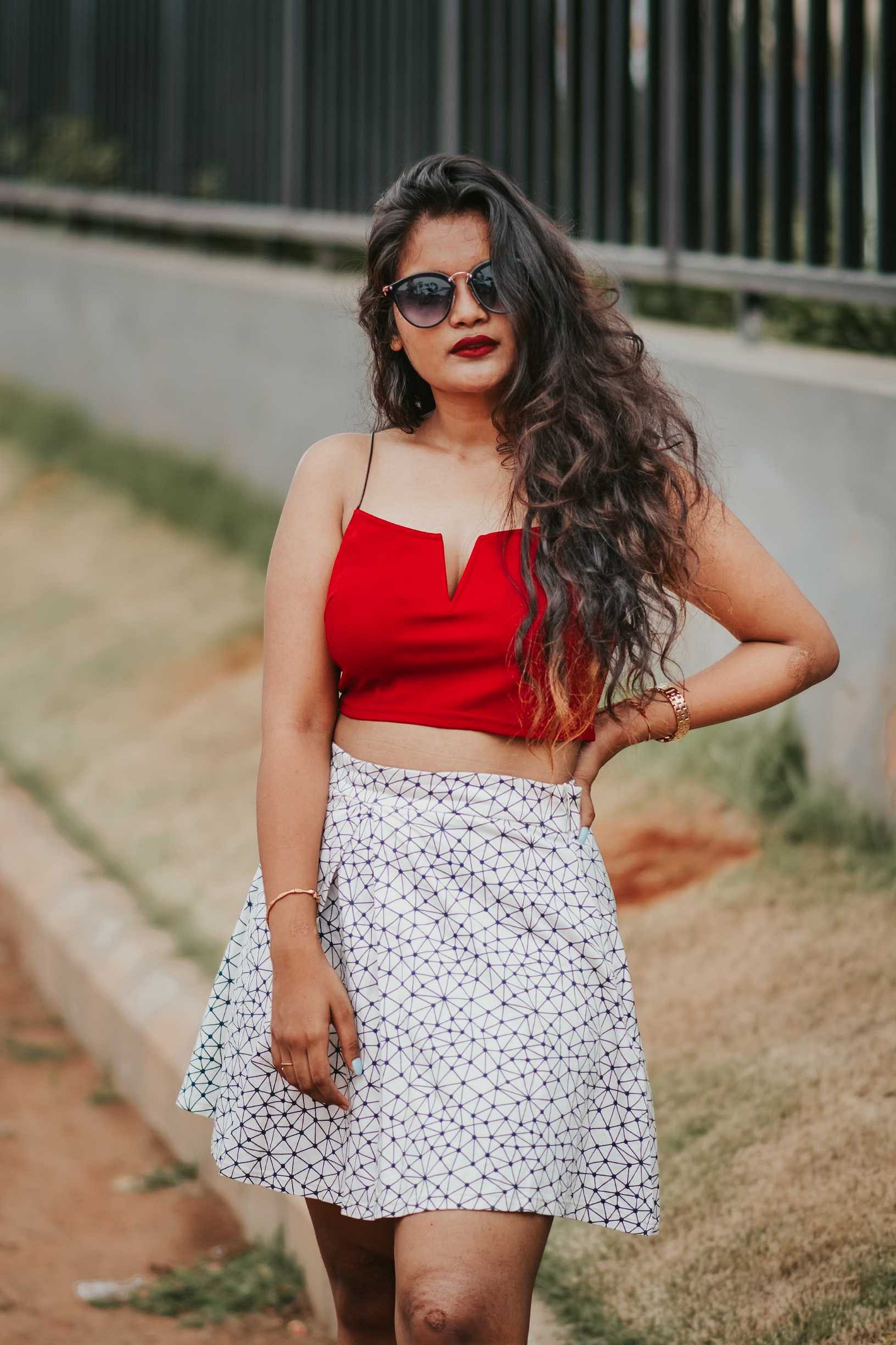 Clothing,White,Orange,Street fashion,Crop top,Fashion,Waist,Eyewear,Shoulder,Lady