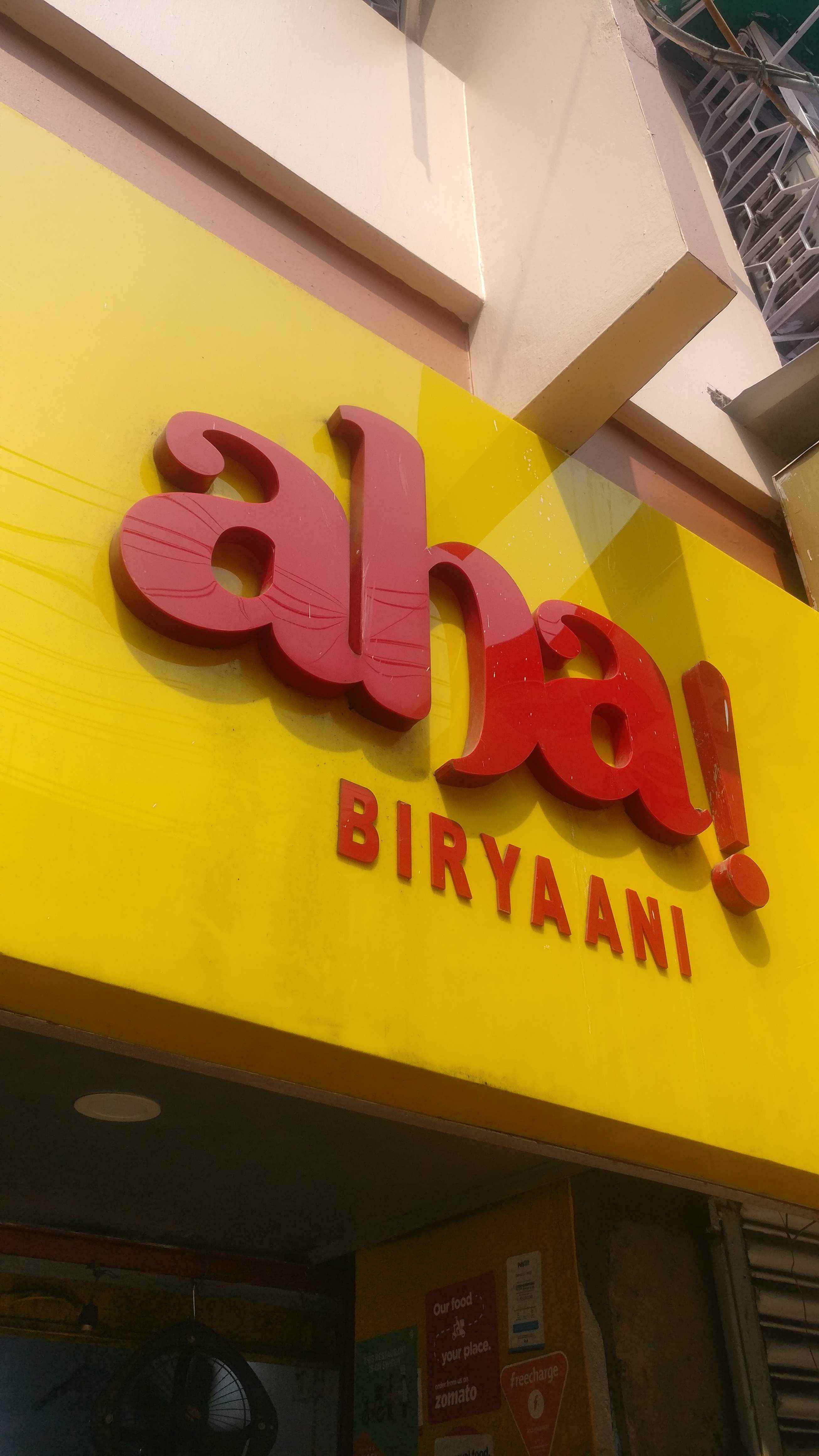 Yellow,Font,Fast food restaurant,Restaurant,Signage,Building