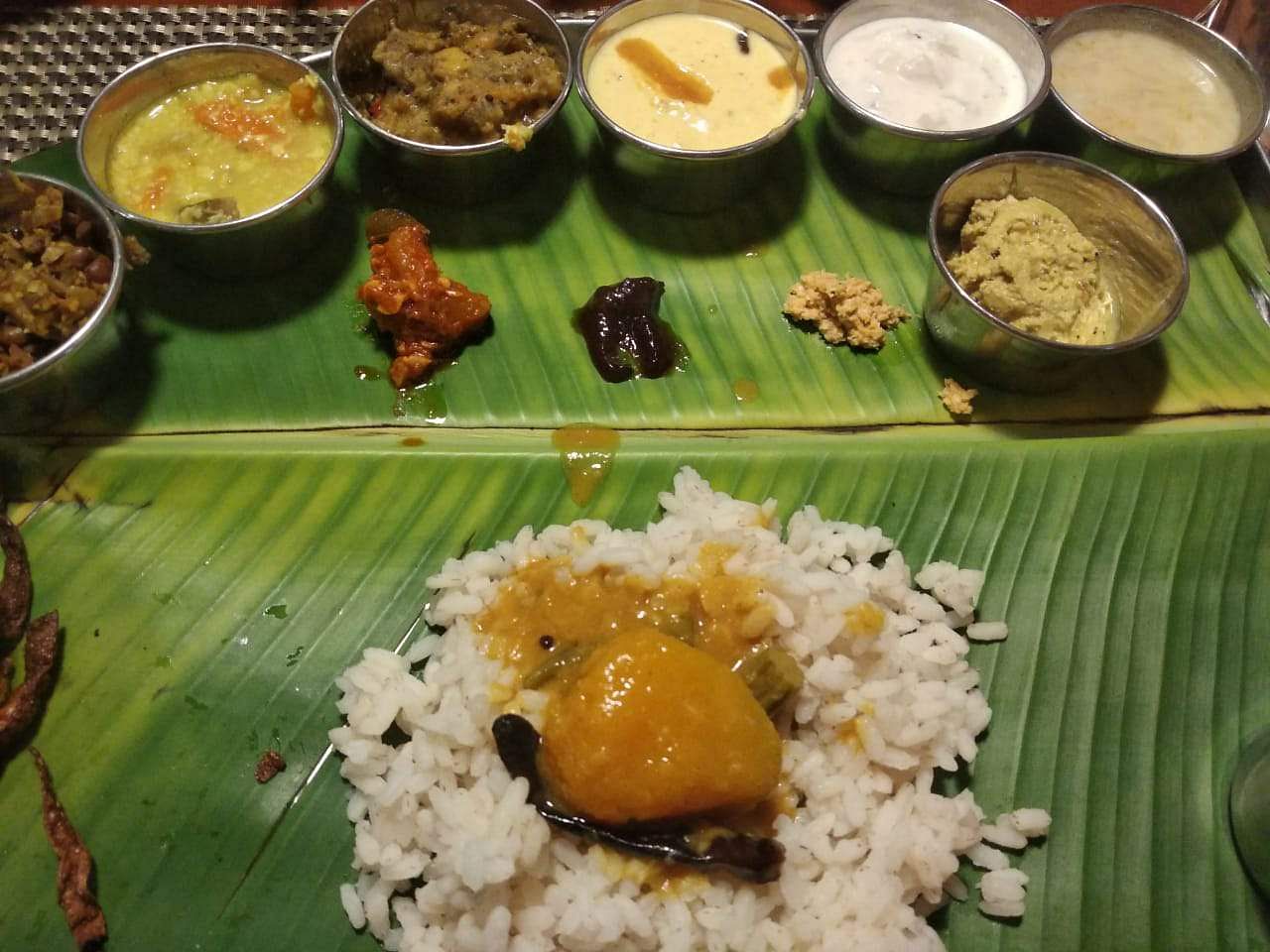 Dish,Food,Cuisine,Sadya,White rice,Banana leaf rice,Steamed rice,Rice,Banana leaf,Ingredient