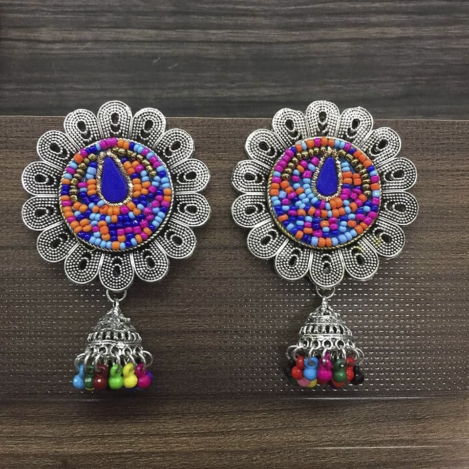 Earrings,Jewellery,Fashion accessory,Body jewelry,Gemstone,Silver,Turquoise,Metal,Jewelry making,Visual arts