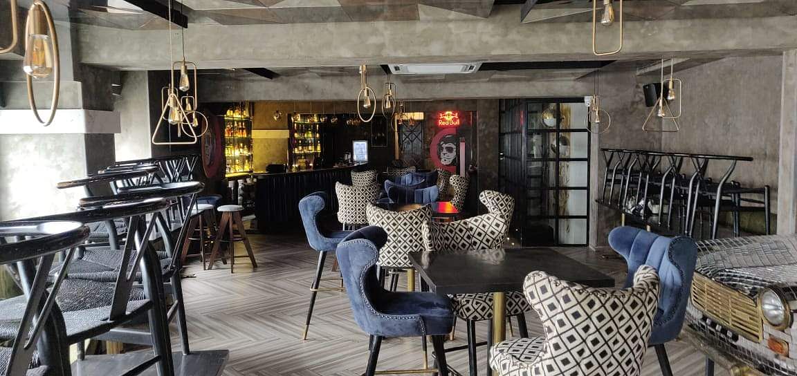 Building,Room,Interior design,Furniture,Loft,Table,House,Restaurant