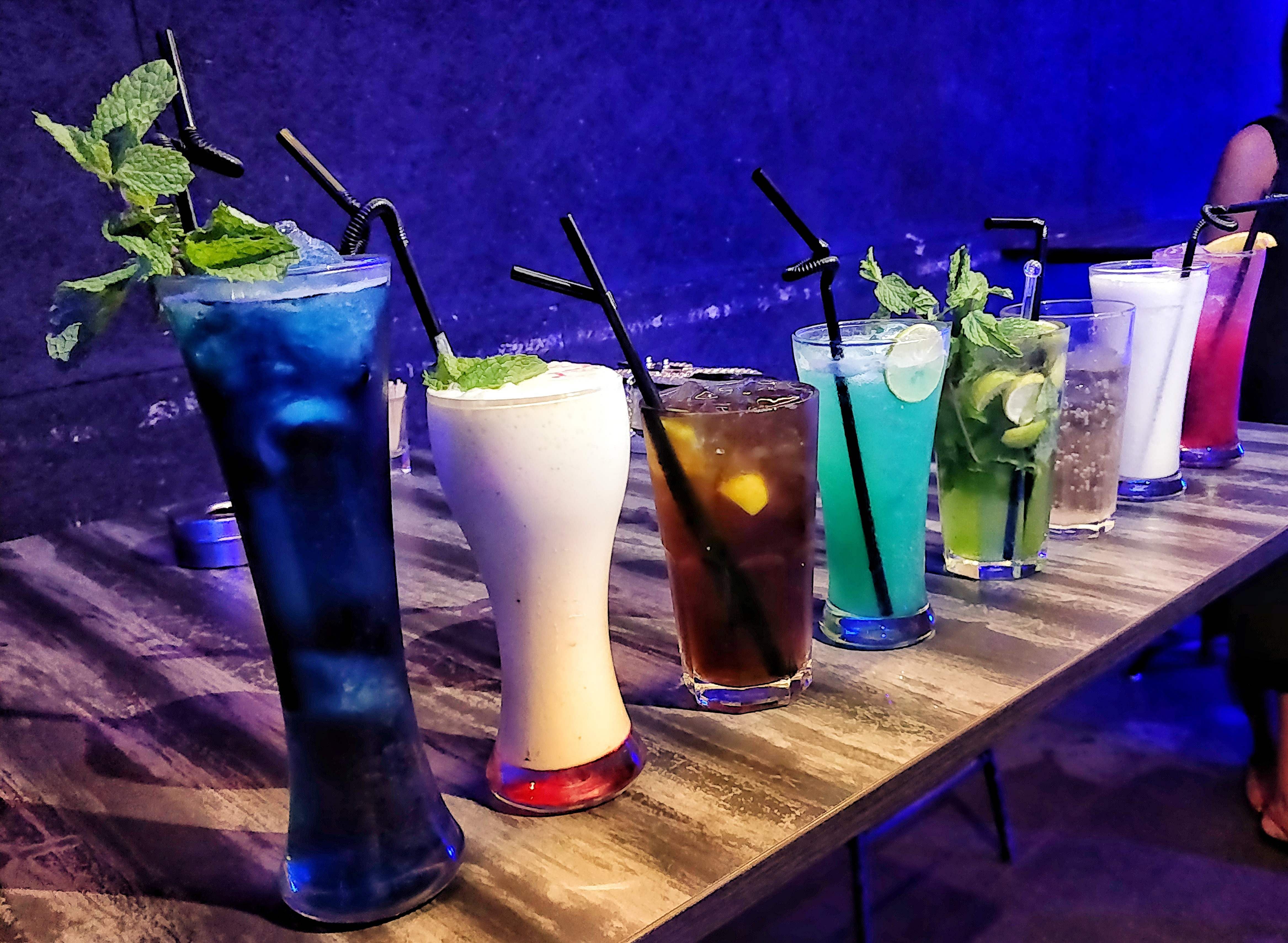 Drink,Distilled beverage,Mojito,Non-alcoholic beverage,Cocktail garnish,Alcoholic beverage,Italian soda,Cocktail,Zombie,Highball