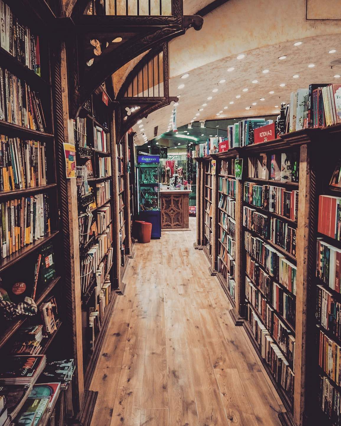 Bookselling,Bookcase,Library,Building,Book,Shelving,Public library,Shelf,Retail,Publication