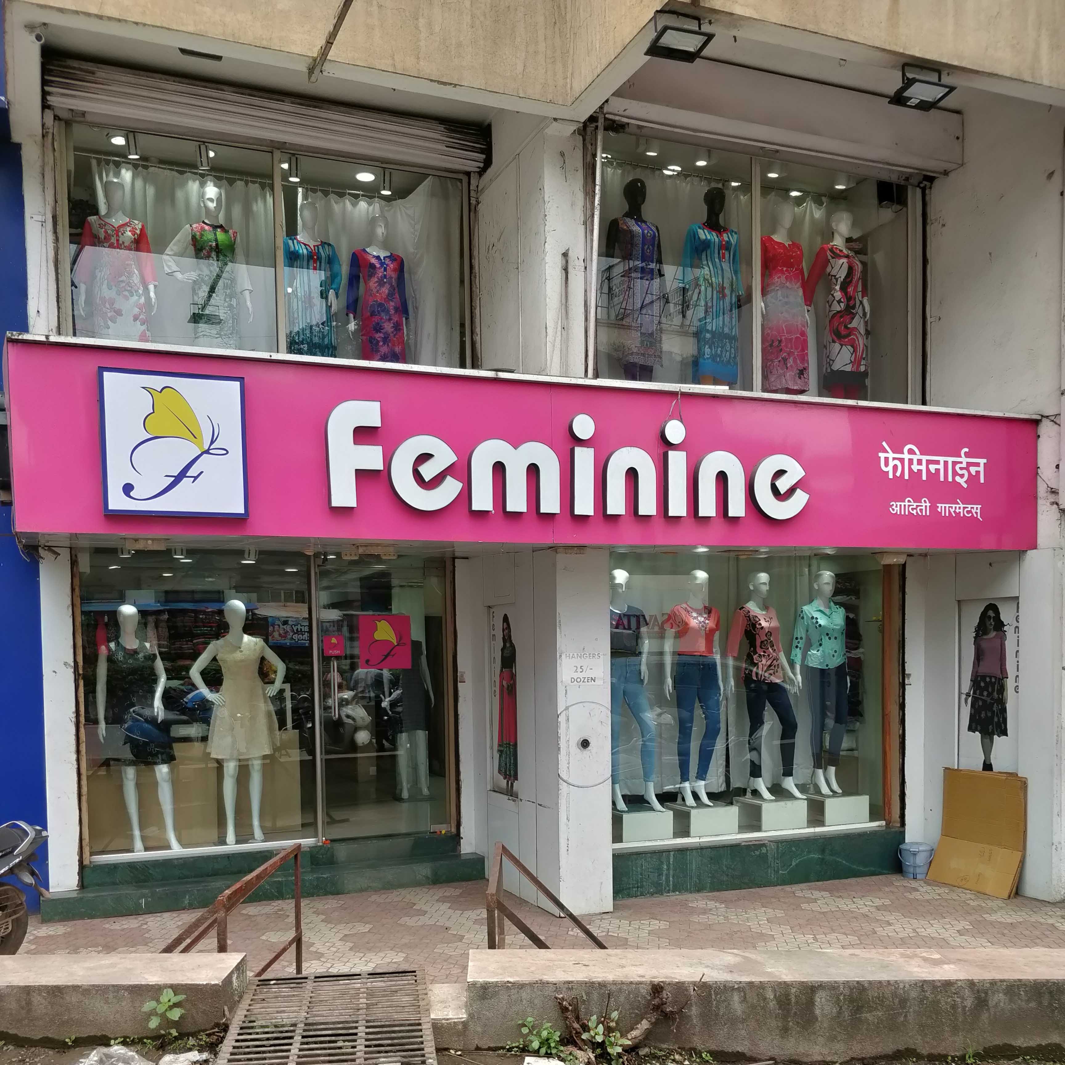 Building,Outlet store,Boutique,Facade,Display window,Door,Retail,Shopping,Advertising,Interior design