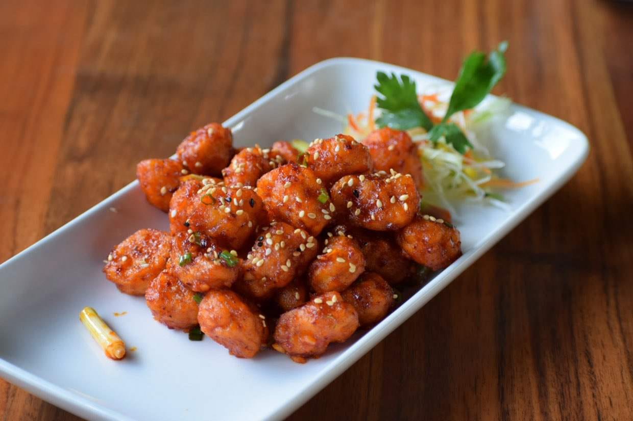 Dish,Food,Cuisine,Ingredient,General tso's chicken,Sesame chicken,Chicken 65,Meatball,Fried food,Orange chicken