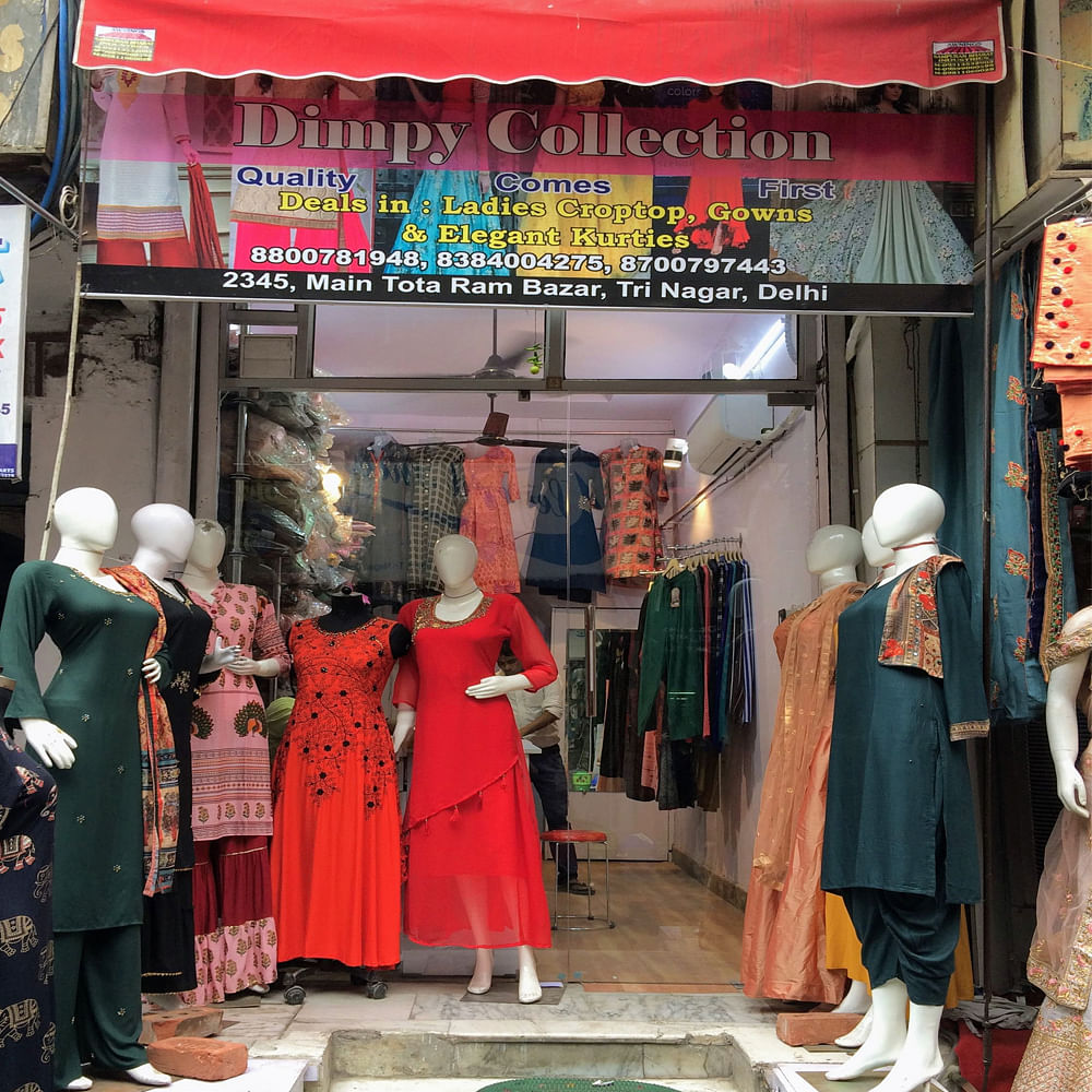 Bazaar,Boutique,Shopping,Display window,Retail,Marketplace,Market,Building,Outerwear,Temple