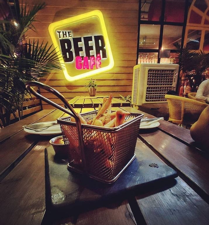 Sky,Night,Table,Room,Restaurant,Meal,Square,Metal,Snack,Drink