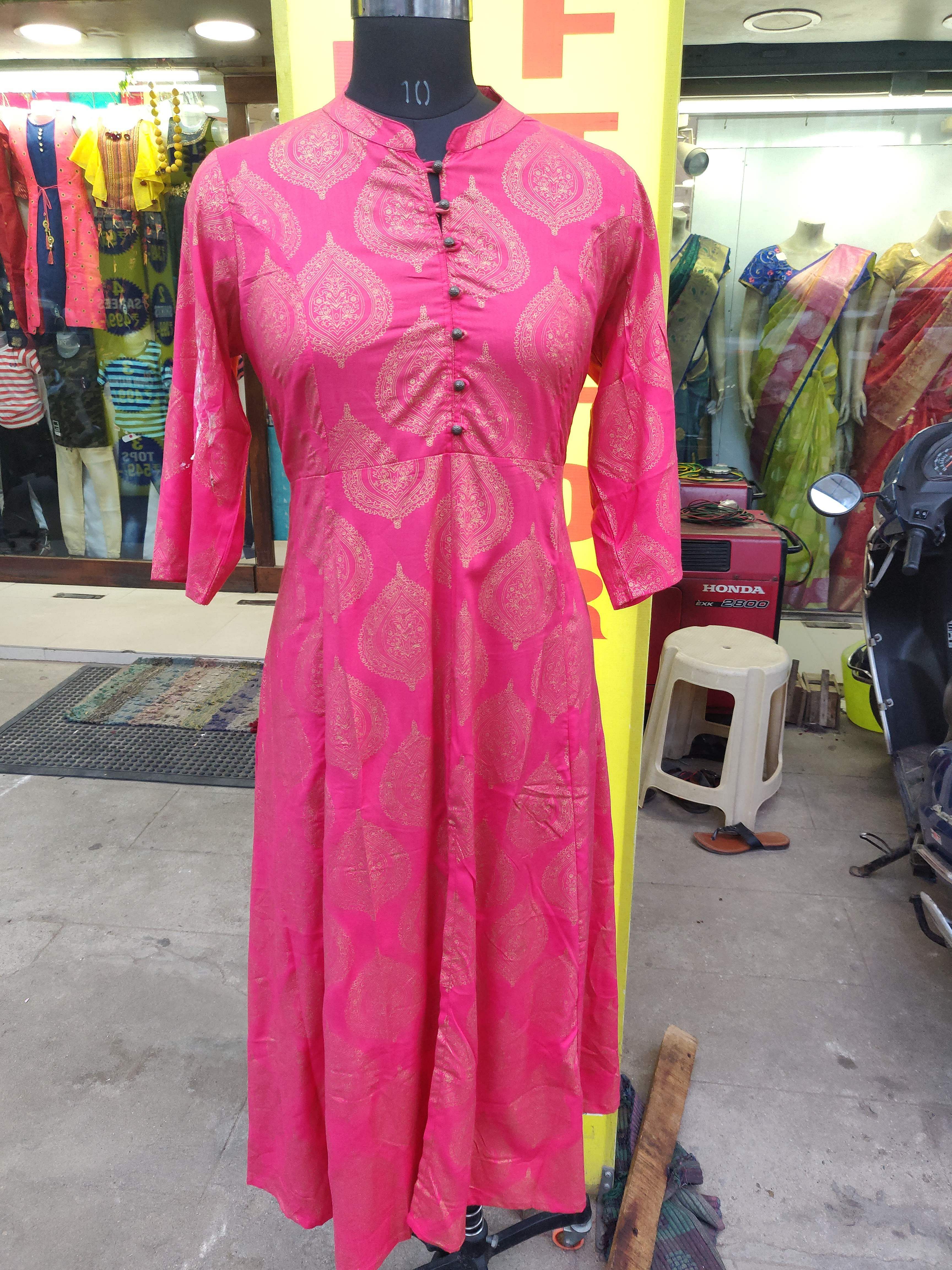 Clothing,Pink,Dress,Boutique,Magenta,Textile,Fashion,Day dress,Formal wear,Footwear