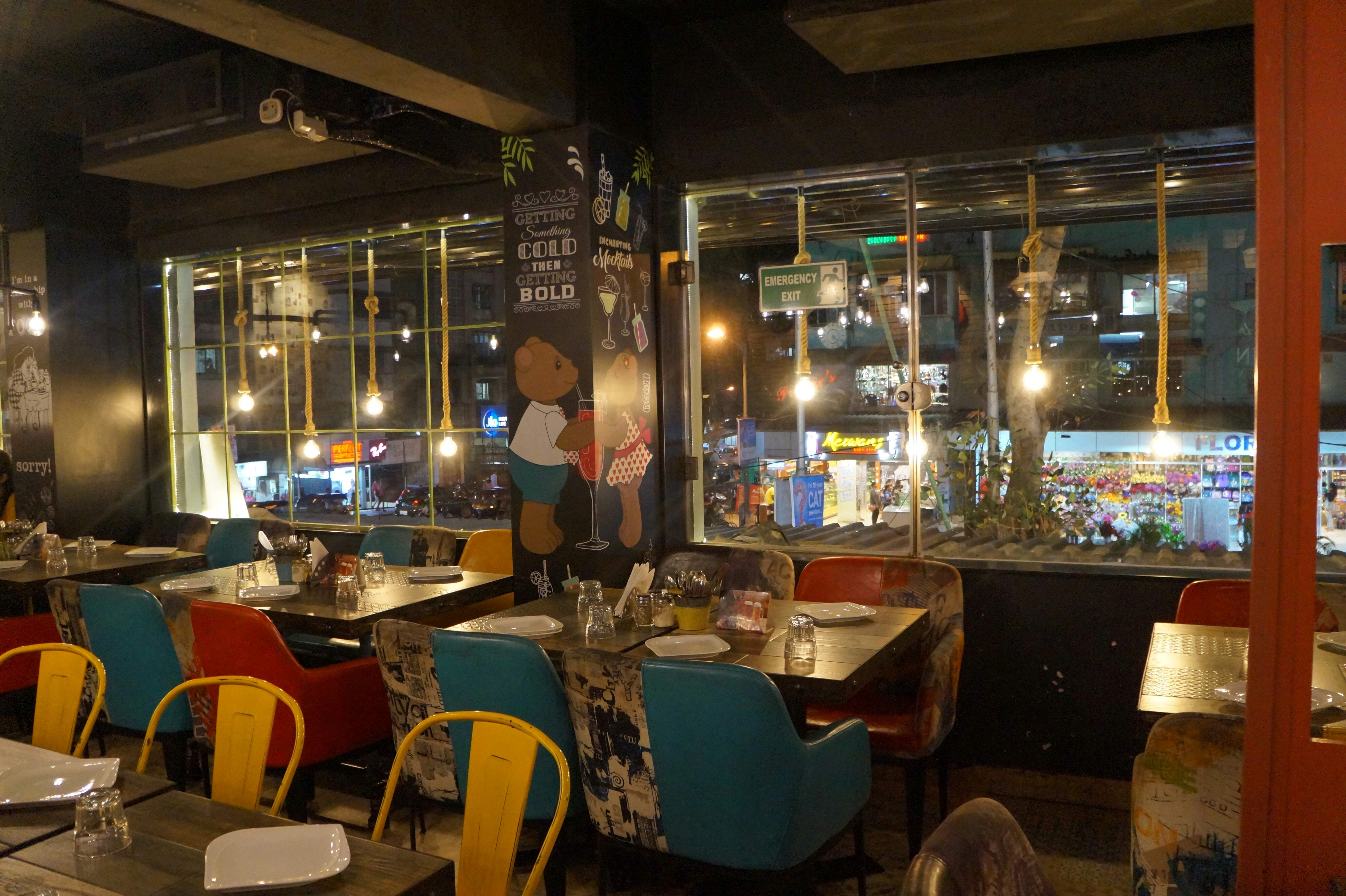 Restaurant,Building,Night,Café,Interior design,Table,Coffeehouse,Room,Architecture,Bar