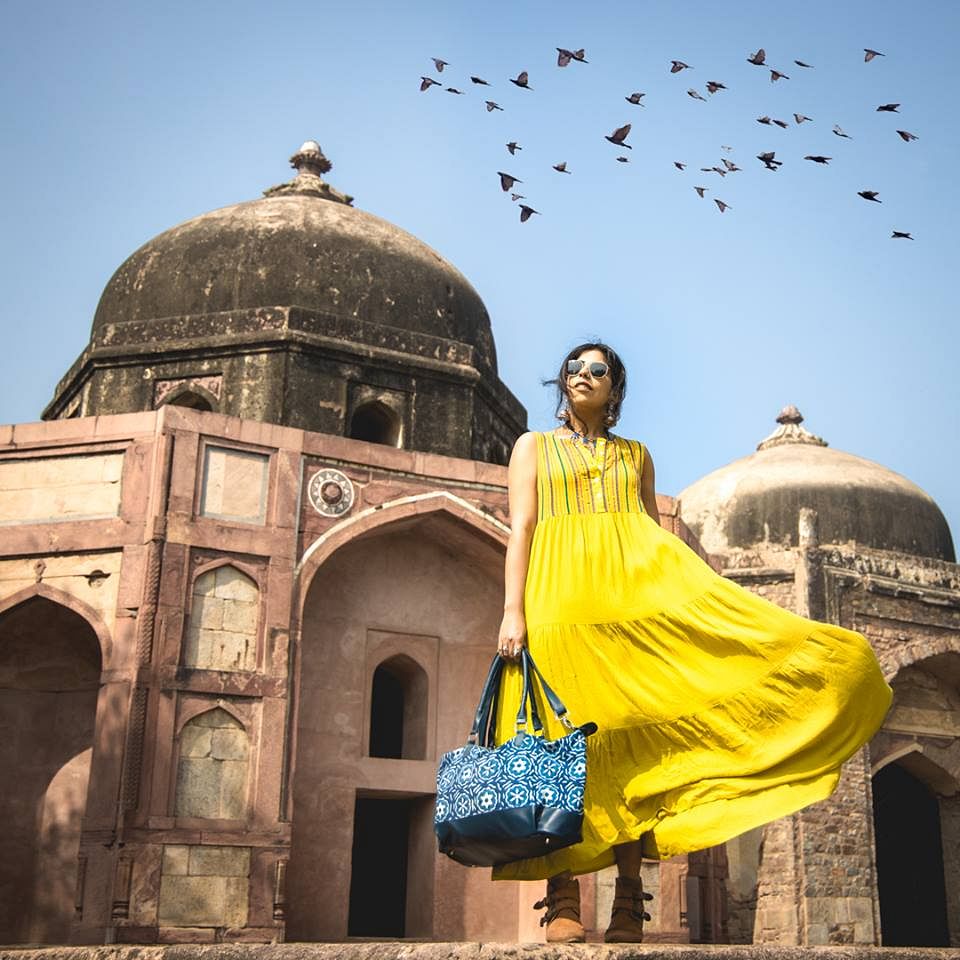 Landmark,Yellow,Dome,Place of worship,Architecture,Tourism,Historic site,Temple,Building,World