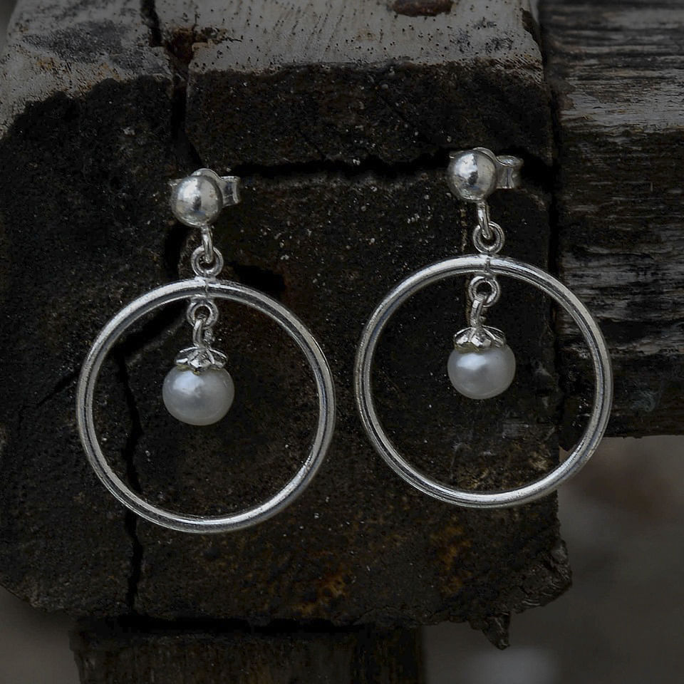 Earrings,Jewellery,Fashion accessory,Pearl,Body jewelry,Silver,Gemstone,Silver,Metal,Circle