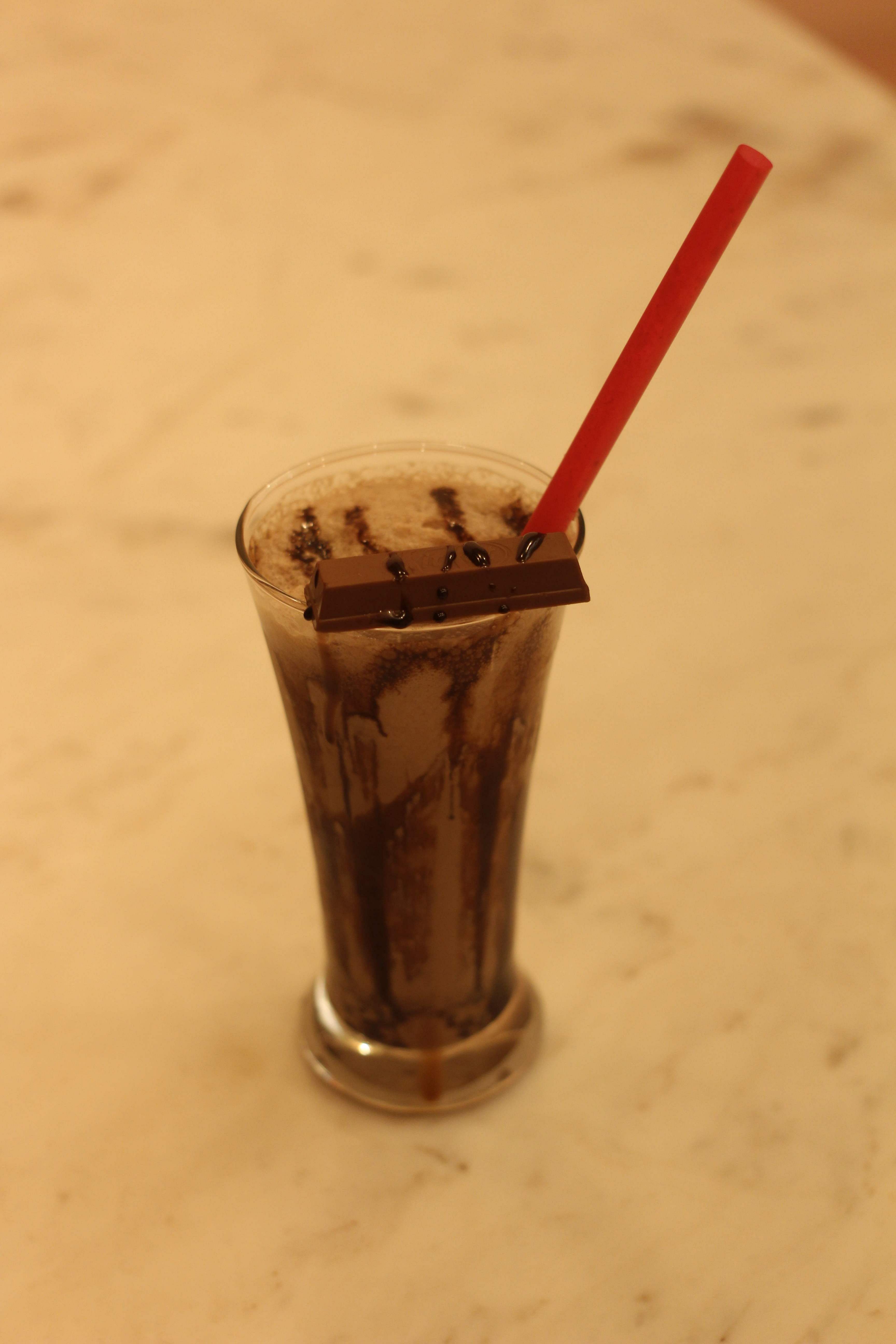 Drink,Milkshake,Non-alcoholic beverage,Frappé coffee,Iced coffee,Food,Drinking straw,Coffee,Malted milk,Smoothie
