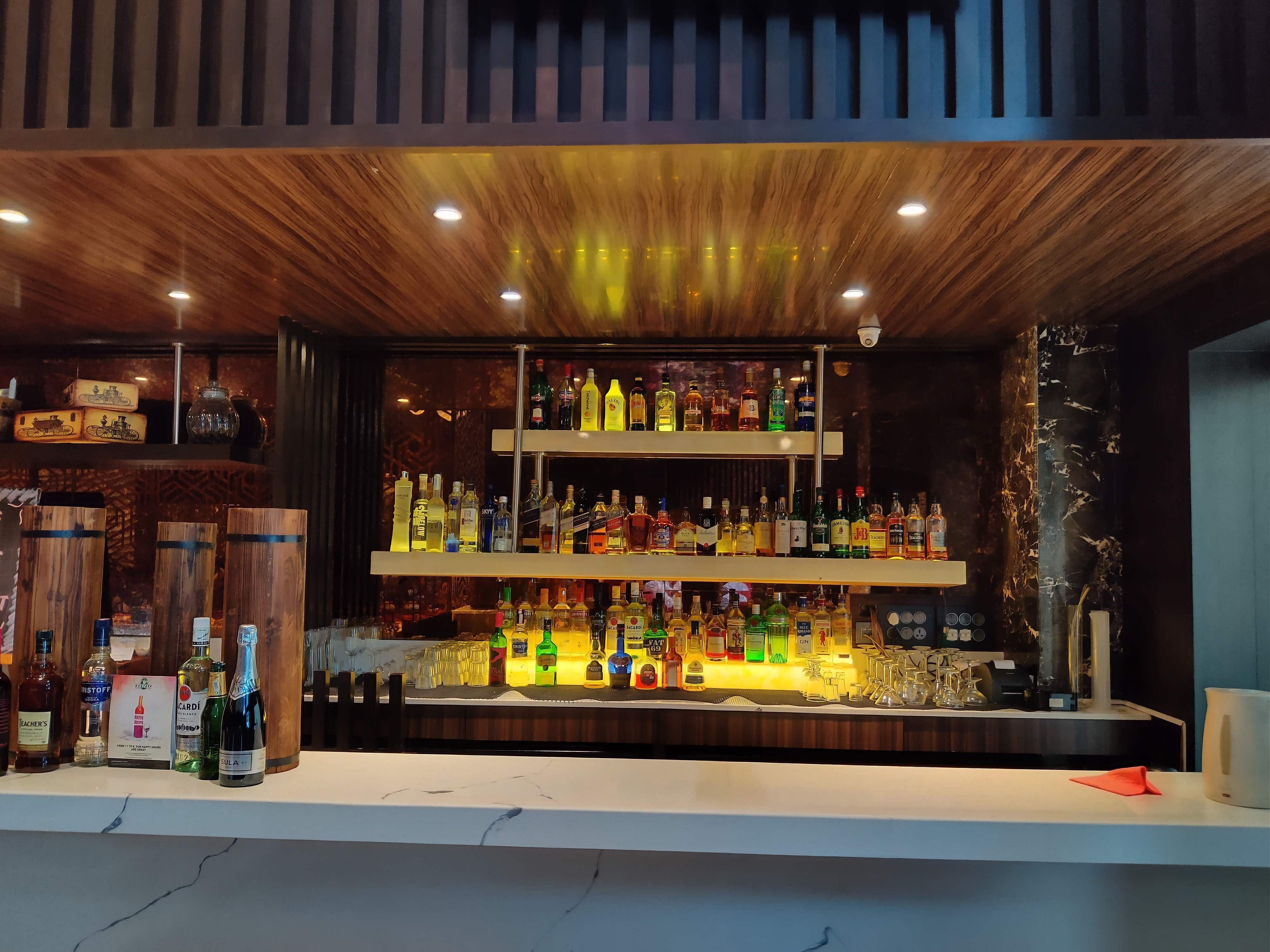 Bar,Drinking establishment,Building,Barware,Liqueur,Distilled beverage,Drink,Pub,Interior design,Alcohol