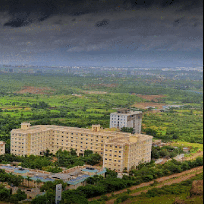 Sky,Nature,Landmark,Human settlement,Cloud,Urban area,City,Aerial photography,Hill,Landscape