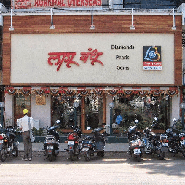 Vehicle,Iron,Building,Motorcycle,Signage,Sign,Facade,Tourism