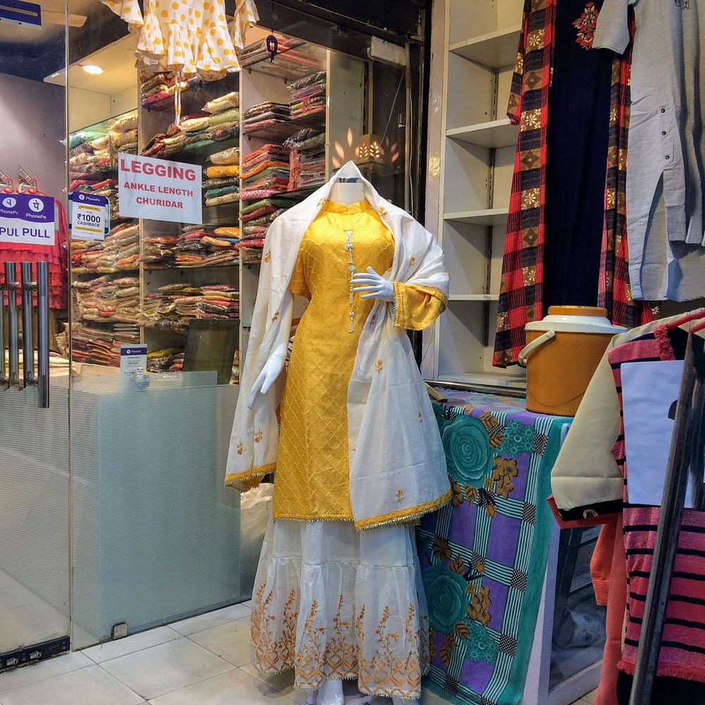 Clothing,Yellow,Snapshot,Boutique,Textile,Shopping,Mannequin,Outerwear,Costume,Retail