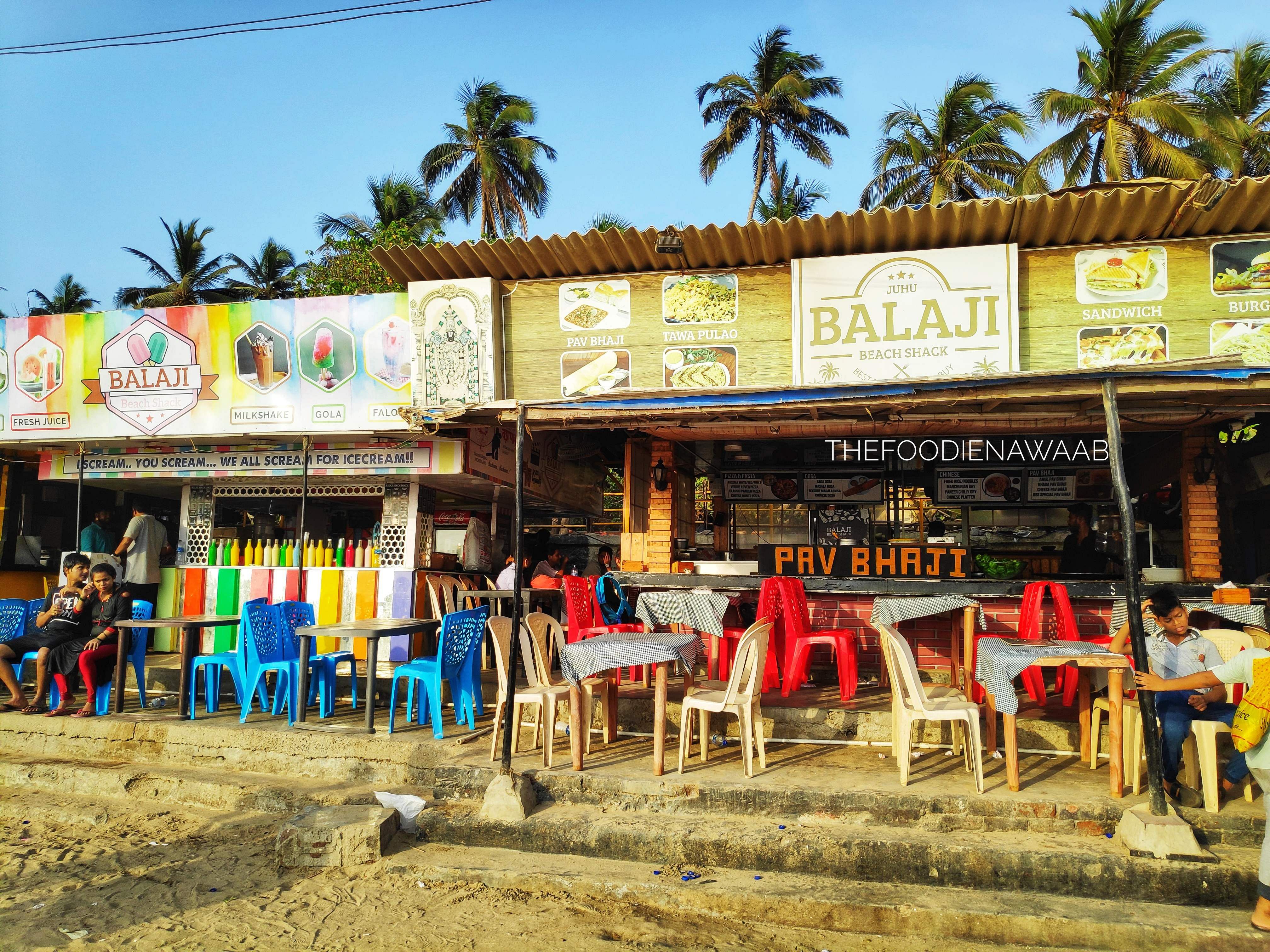 Vacation,Tree,Beach,Palm tree,Building,Restaurant,Tourism,Arecales,Travel,Plant