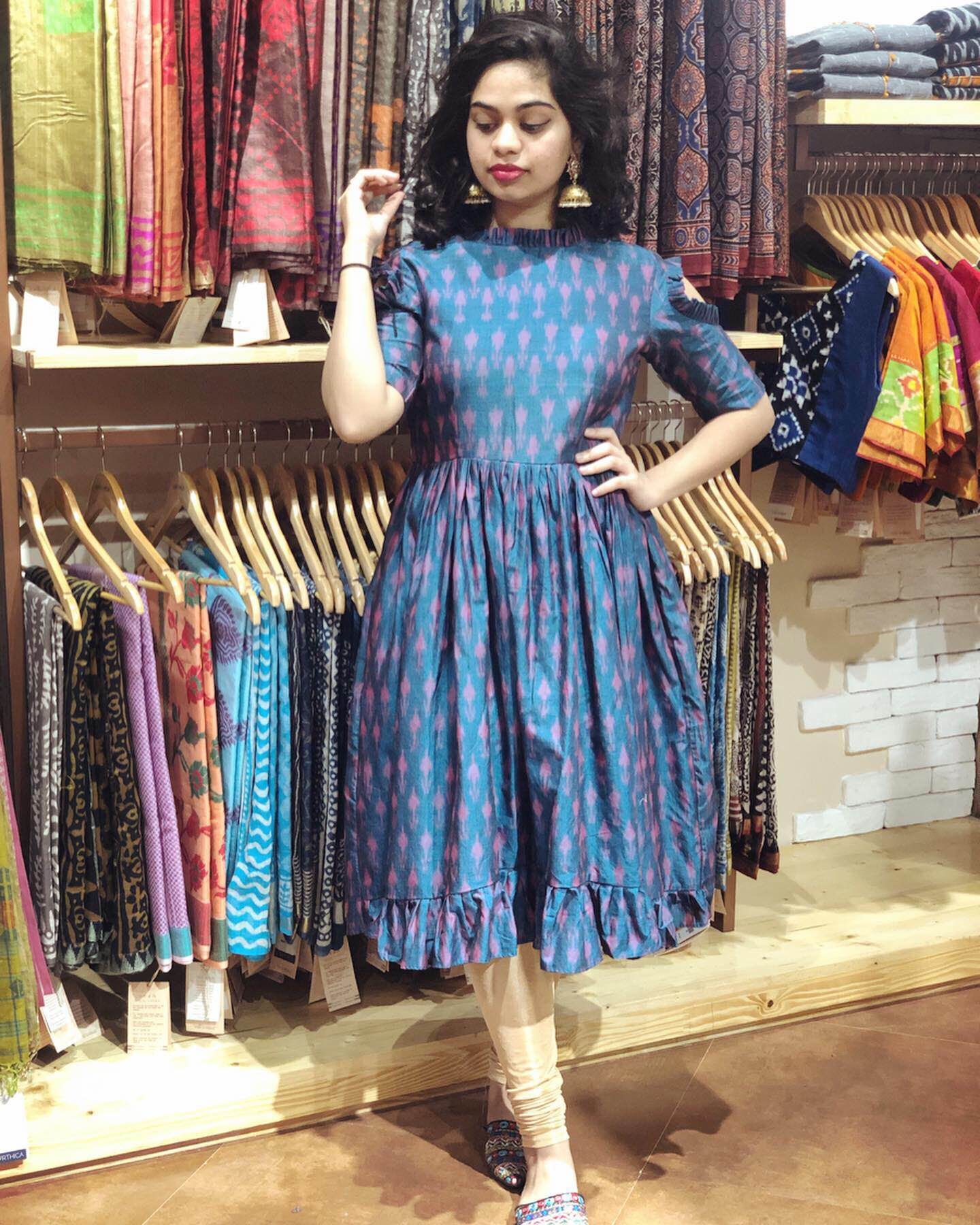 Clothing,Boutique,Dress,Fashion,Formal wear,Fashion design,Textile,Footwear,Vintage clothing,Design