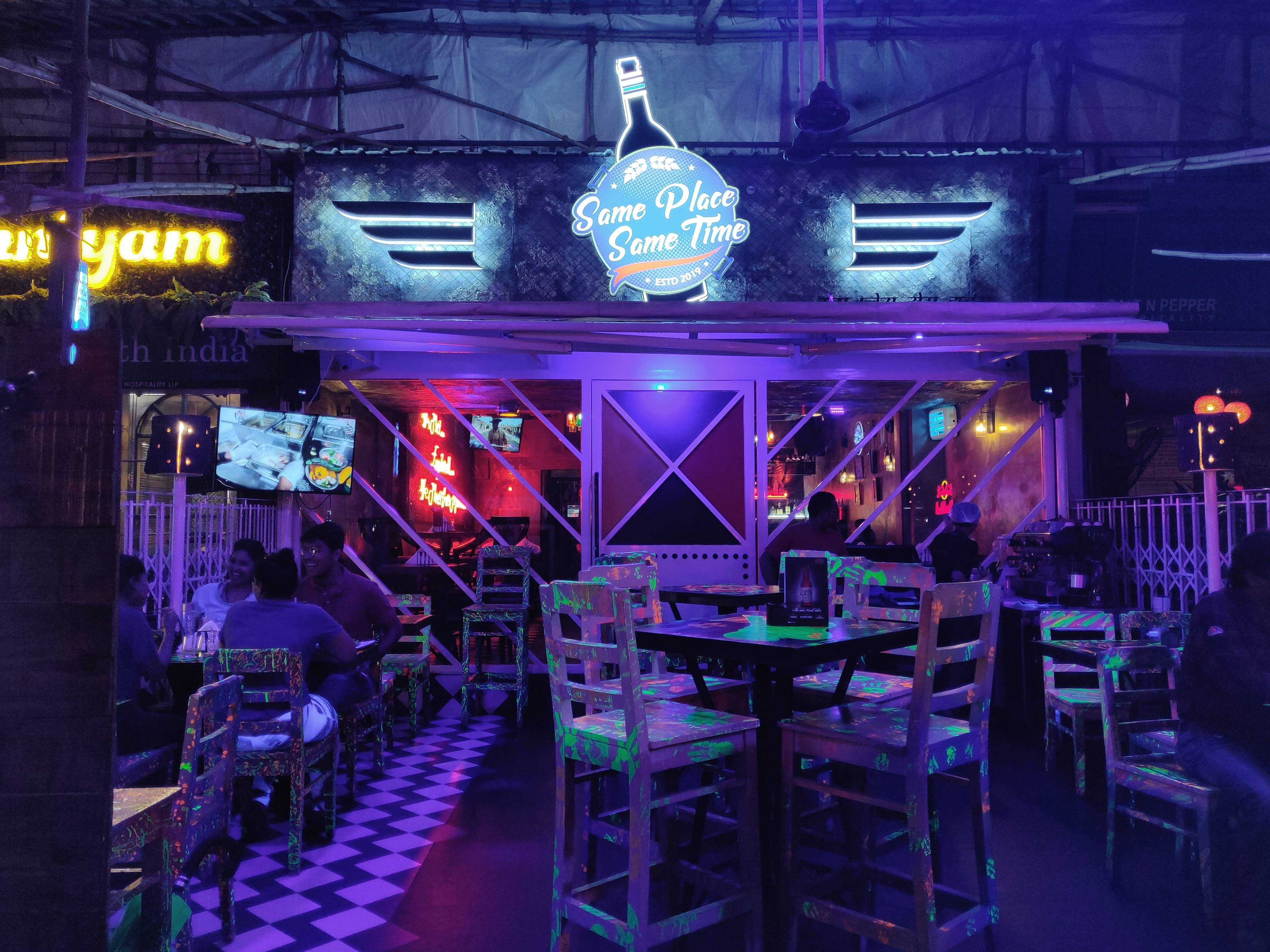 Nightclub,Lighting,Disco,Music venue,Purple,Pub,Bar,Table,Night,Visual effect lighting