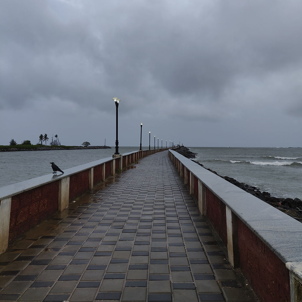 Water,Sky,Sea,Walkway,Boardwalk,Breakwater,Ocean,Cloud,Line,Coast