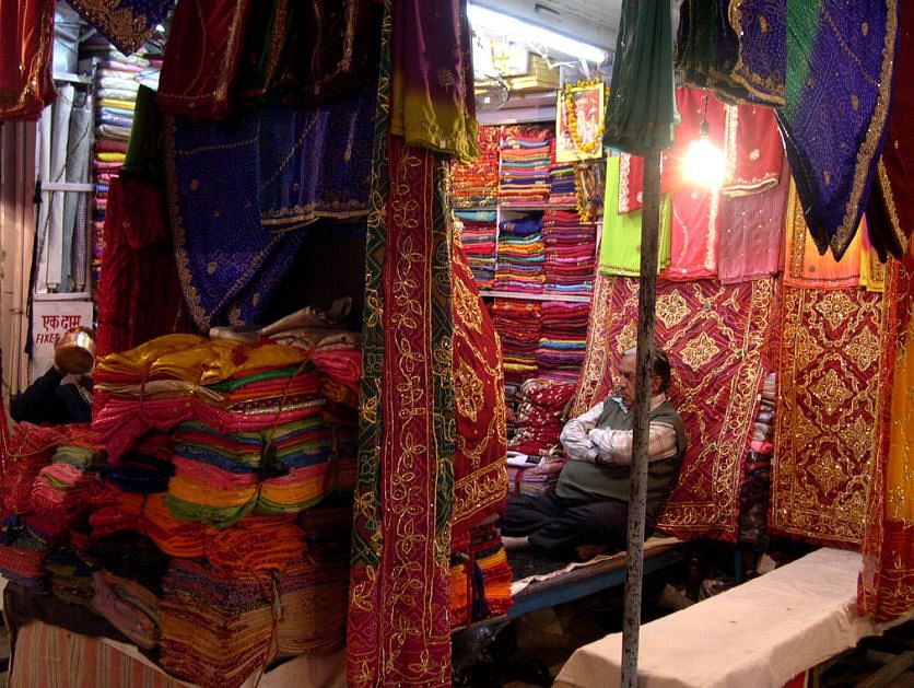 Bazaar,Market,Public space,Textile,Marketplace,Human settlement,City,Room,Thread,Selling