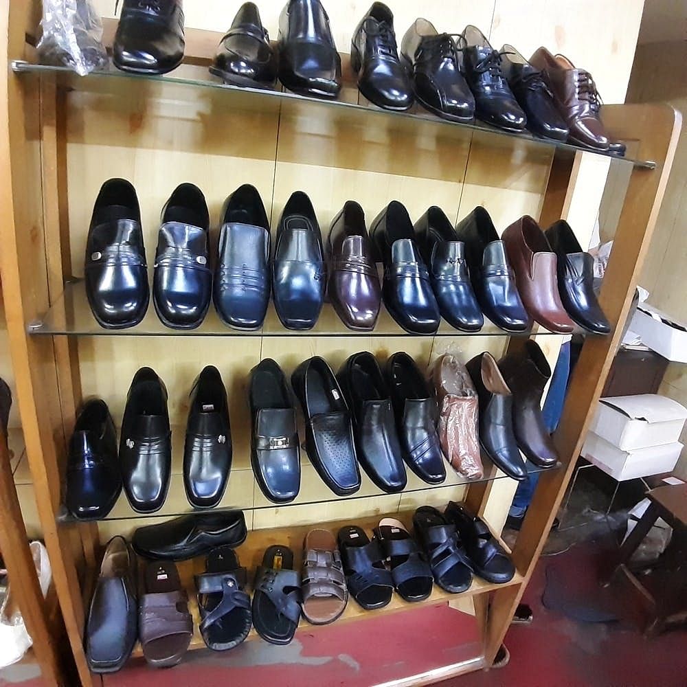 Footwear,Shoe store,Shoe,Collection,Shoe organizer,Shelf,Athletic shoe