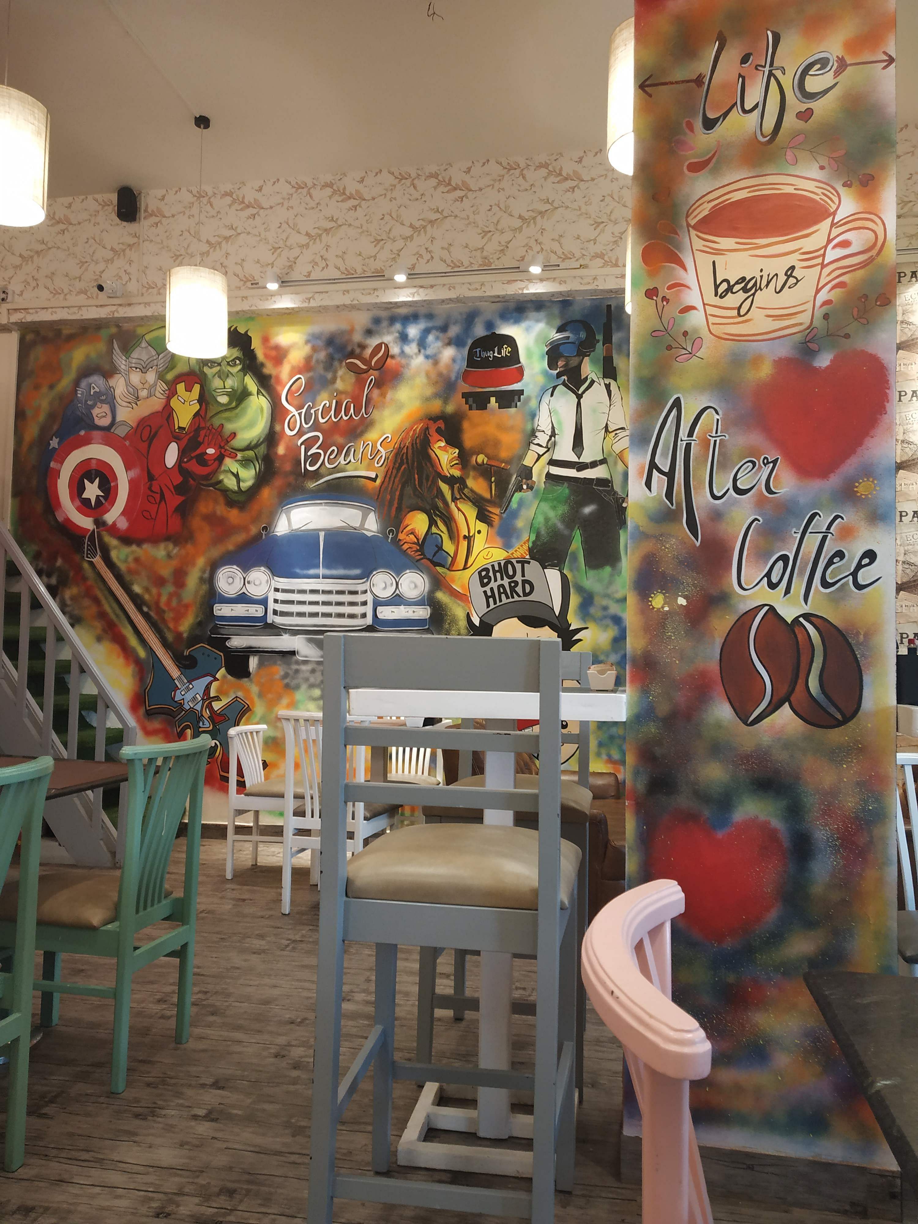 Wall,Art,Interior design,Mural,Street art,Snack,Graffiti,Fast food,Building,Restaurant