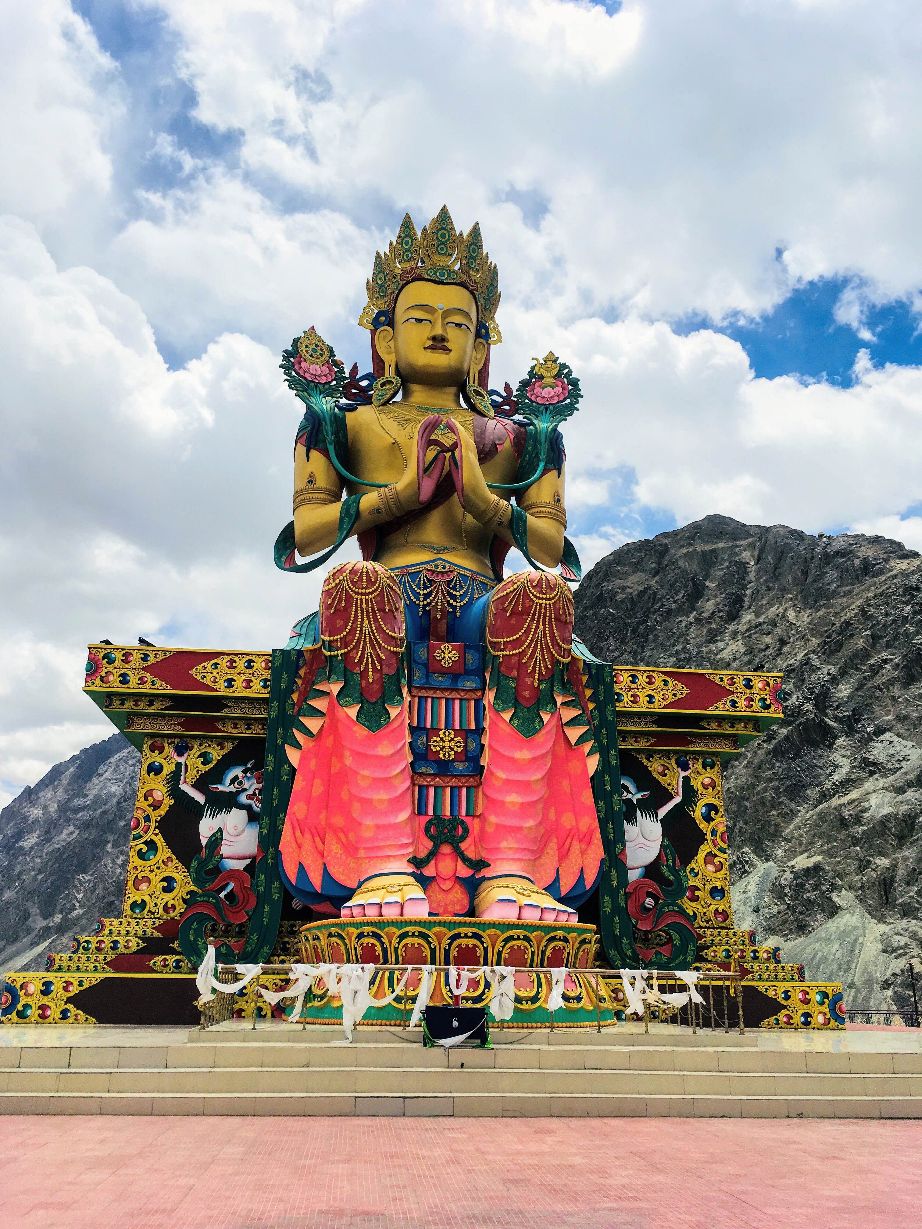 Hindu temple,Temple,Landmark,Place of worship,Statue,Sky,Temple,Tourism,Shrine,Mythology