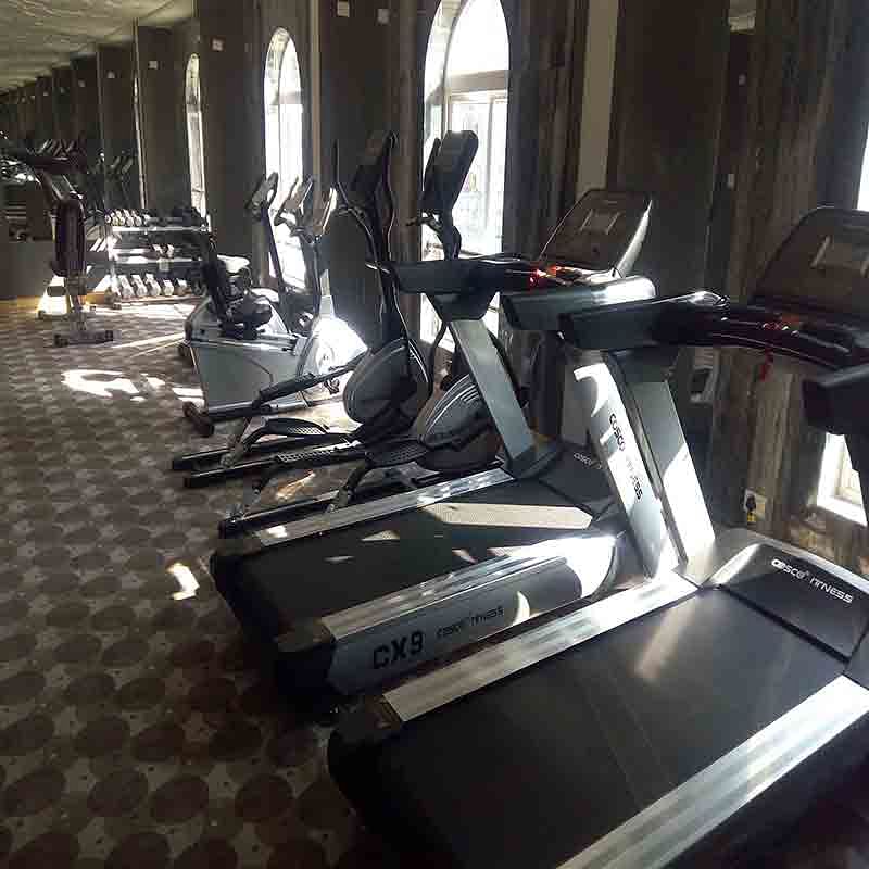 Treadmill,Exercise machine,Exercise equipment,Gym,Room,Sports equipment,Sport venue,Elliptical trainer,Physical fitness