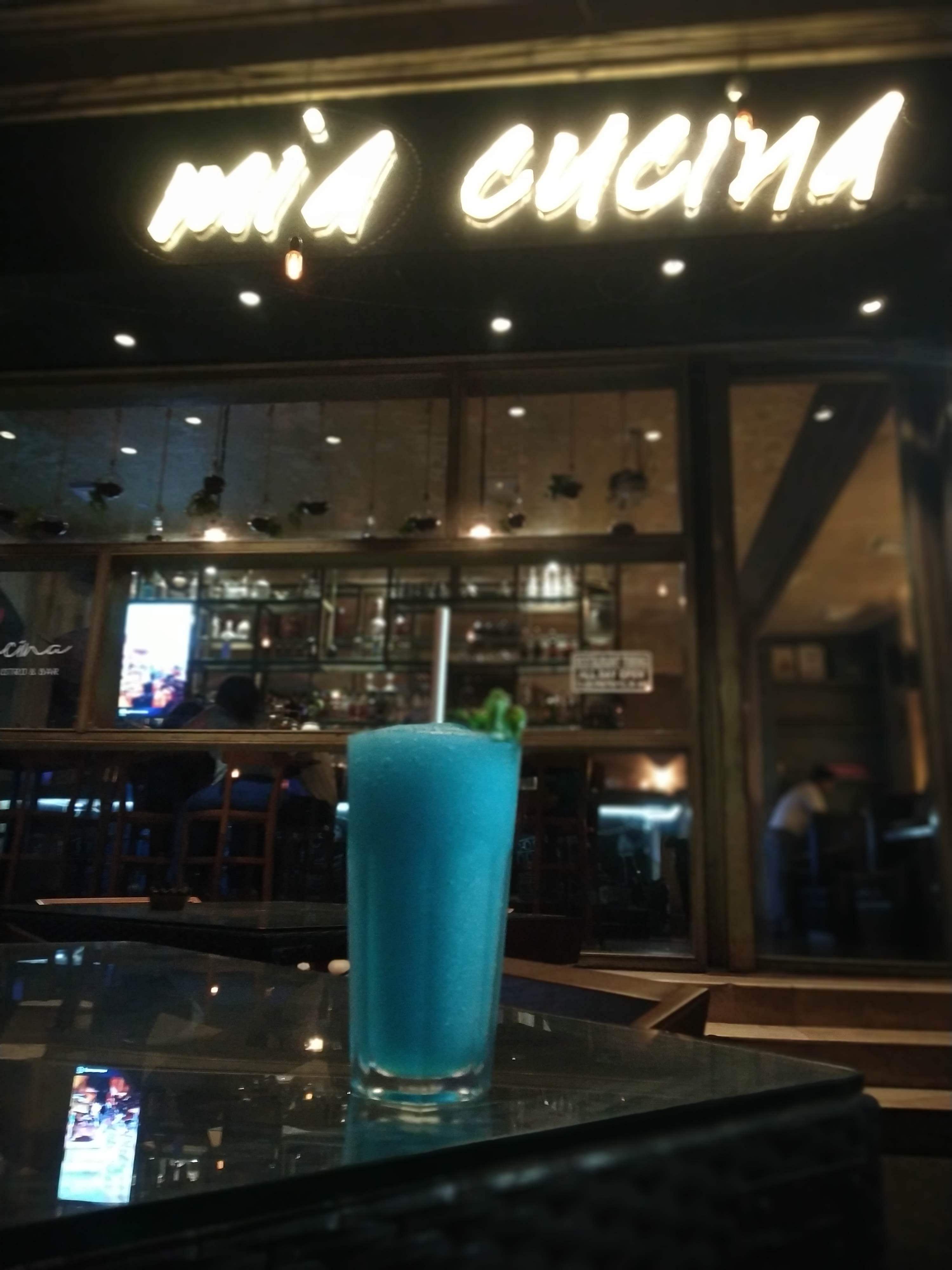 Drink,Distilled beverage,Blue lagoon,Building,Non-alcoholic beverage,Bar,Liqueur