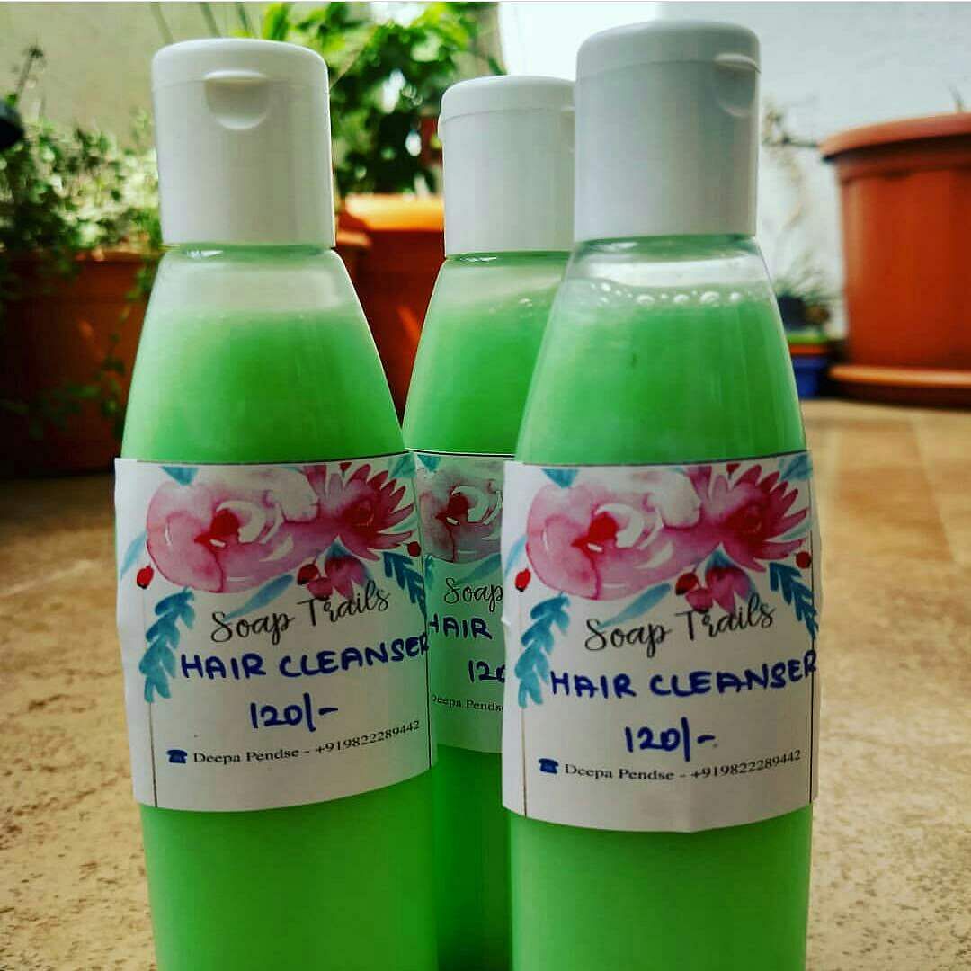 Product,Green,Plastic bottle,Bottle,Water,Liquid,Lotion,Skin care,Hand,Plant