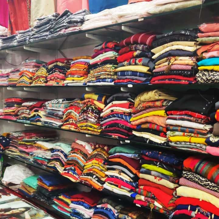 Bazaar,Market,Outlet store,Footwear,Textile,Fashion accessory,Marketplace,Retail,T-shirt,Collection