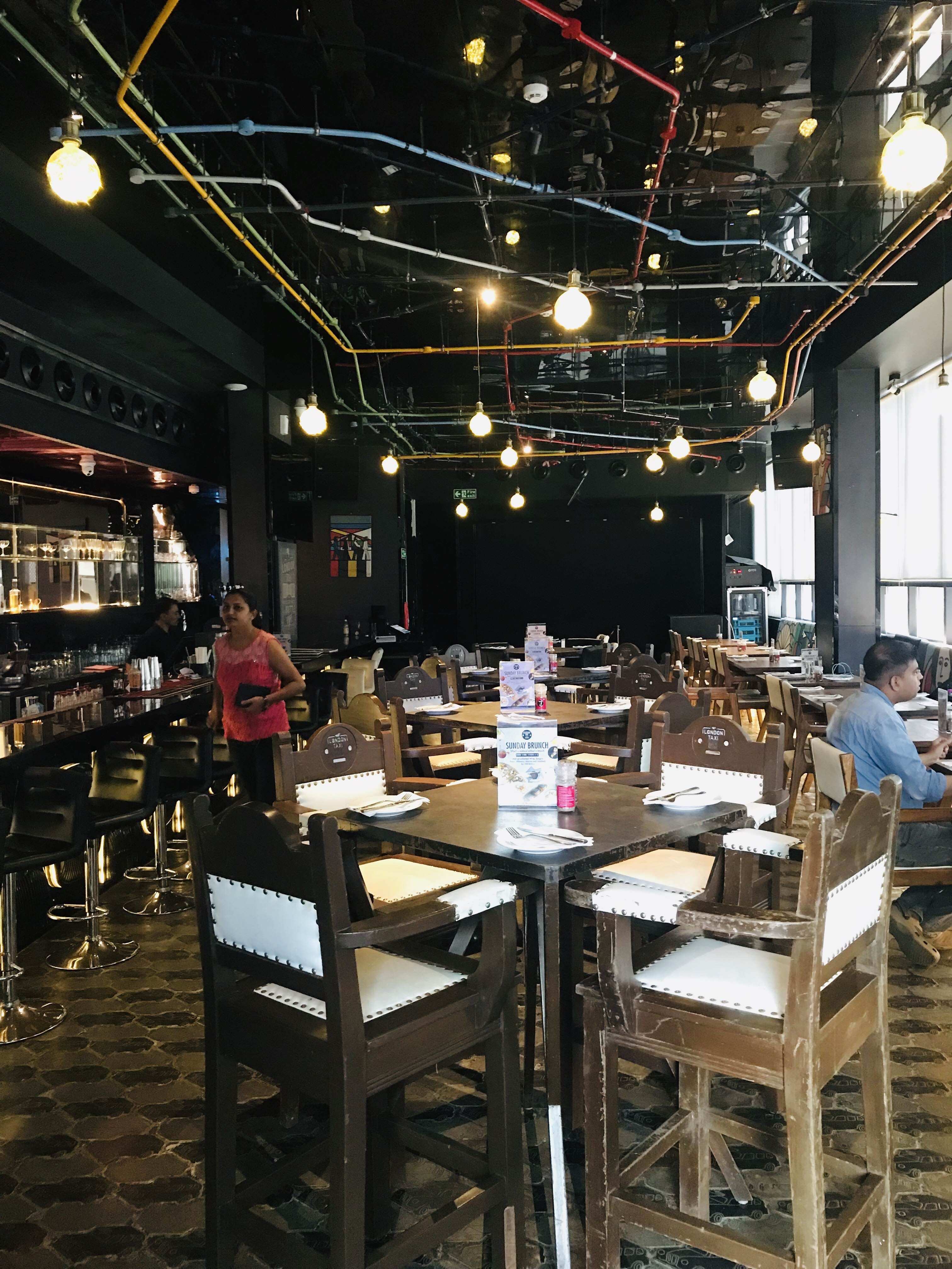 Restaurant,Building,Table,Café,Interior design,Architecture,Furniture,Business,Tavern,Organization