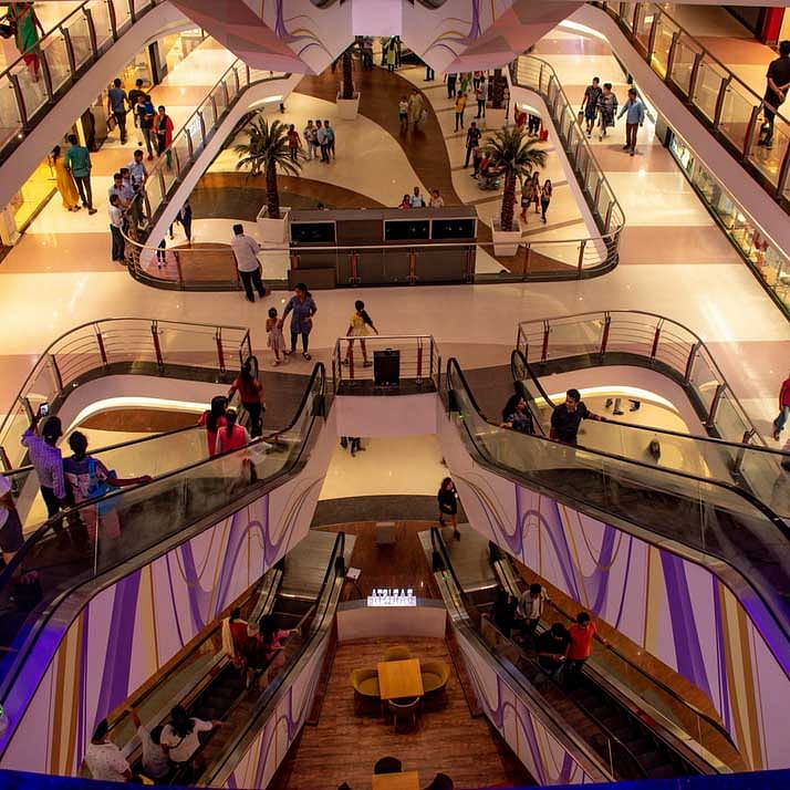 Escalator,Shopping mall,Building,Architecture,Retail,Stairs