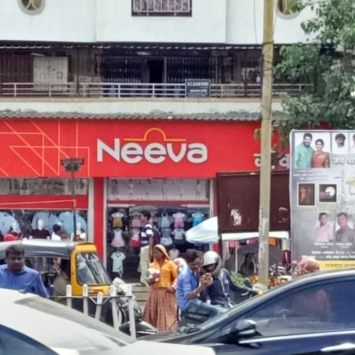 Vehicle,Building,Car,Neighbourhood,Outlet store,Traffic,Street,Retail,Metal,Shopping
