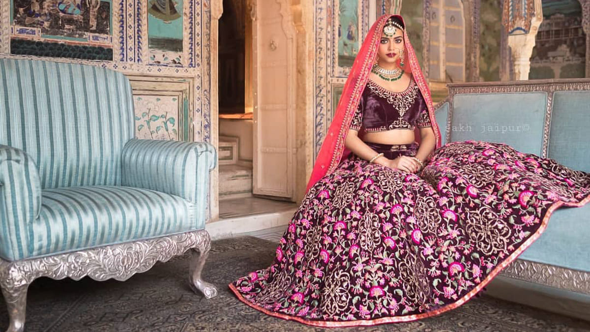 Pink,Magenta,Dress,Purple,Furniture,Room,Textile,Photo shoot,Couch,Classic