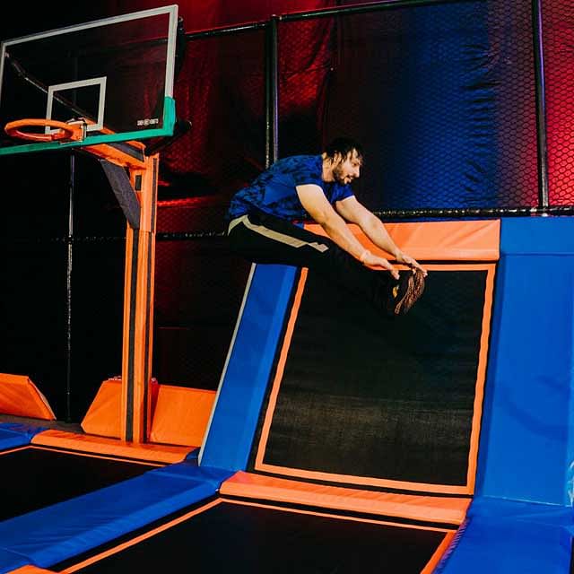 Flip (acrobatic),Performance,Gymnastics,Electric blue,Acrobatics,Trampolining,Trampolining--Equipment and supplies,Leisure,Sports equipment,Trampoline