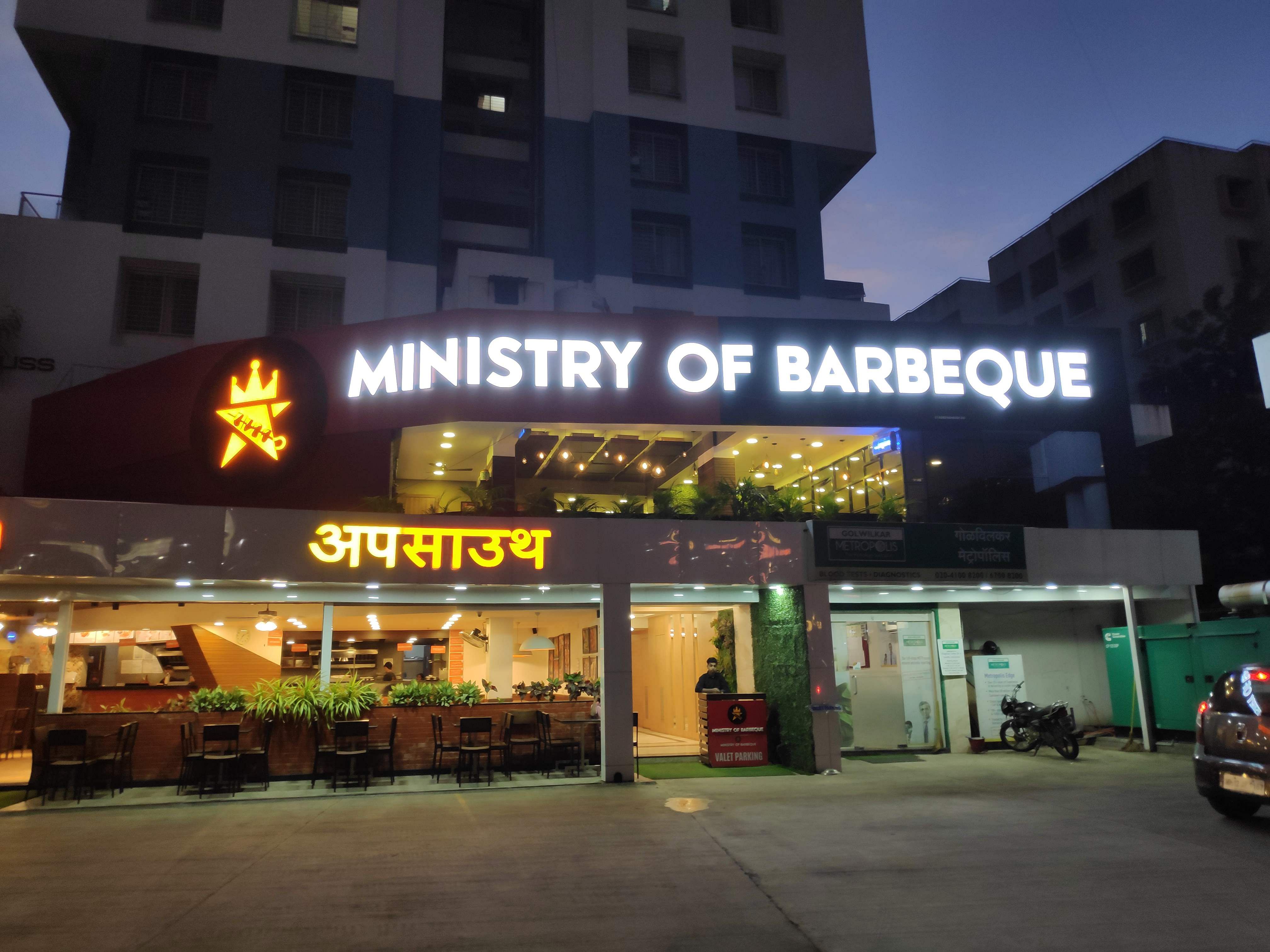 Building,Night,Architecture,Mixed-use,Facade,Electronic signage,Fast food restaurant,Signage,City