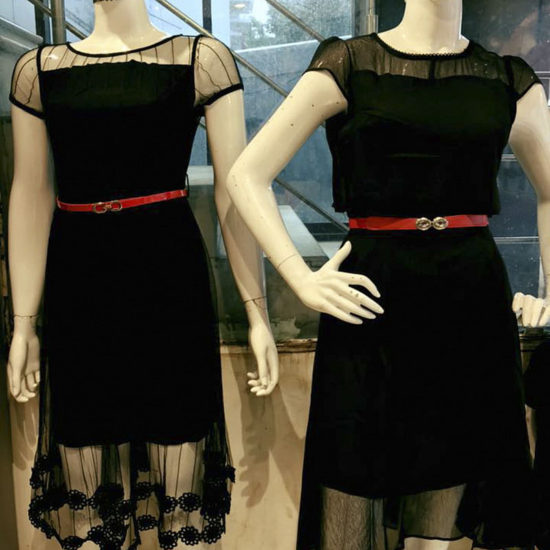 Clothing,Dress,Cocktail dress,Black,Day dress,Mannequin,Fashion,Little black dress,Formal wear,Fashion design