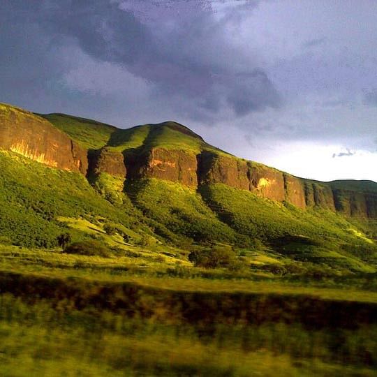 Highland,Mountainous landforms,Nature,Natural landscape,Hill,Mountain,Green,Sky,Grassland,Wilderness