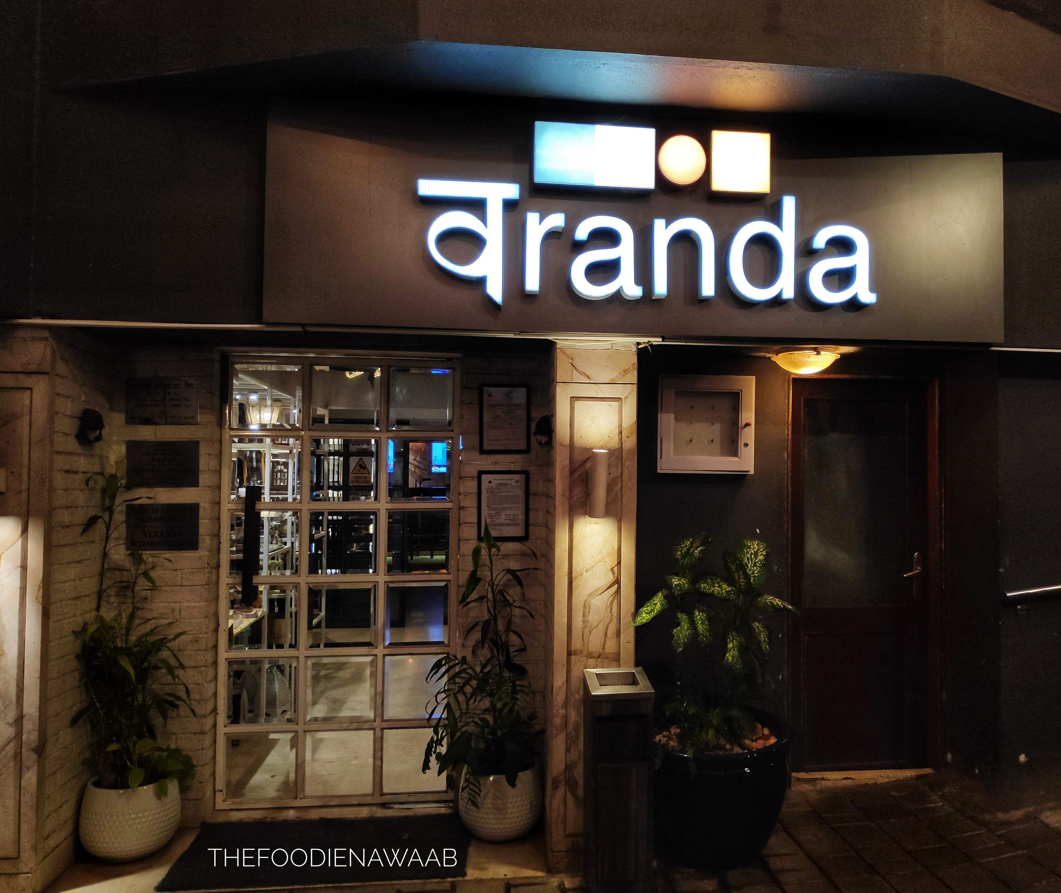 Building,Night,Signage,Font,Restaurant,Facade