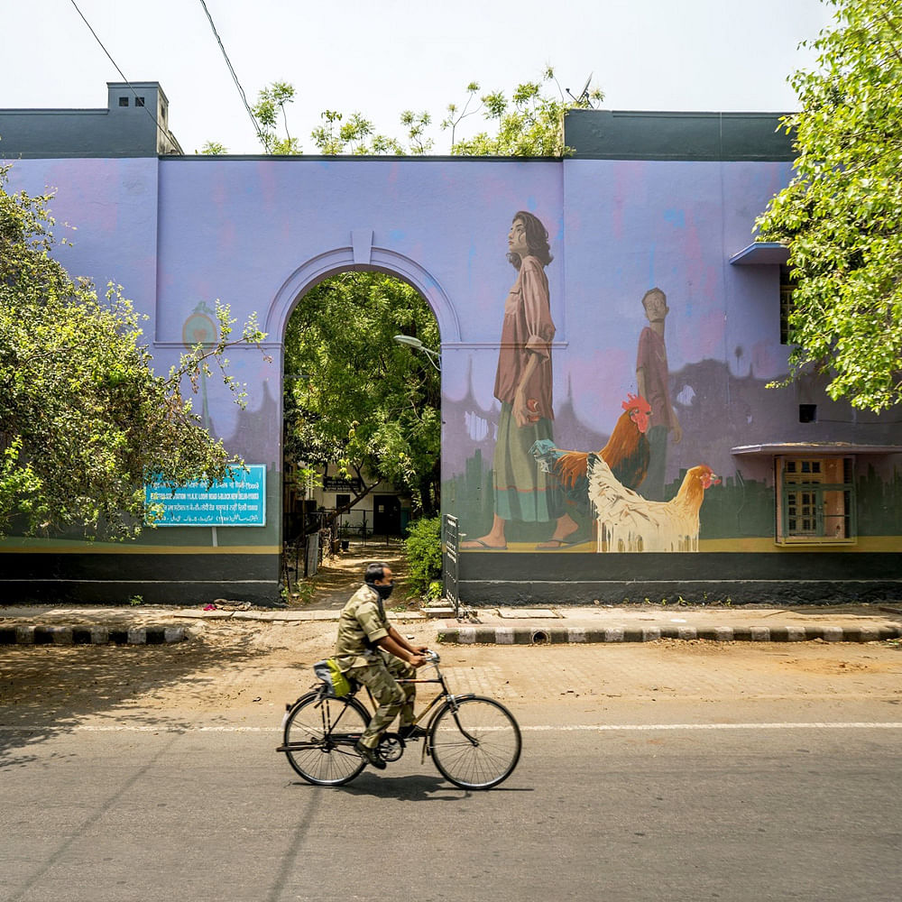 Bicycle,Green,Architecture,Wall,Tree,Transport,Vehicle,Yellow,Urban area,Arch