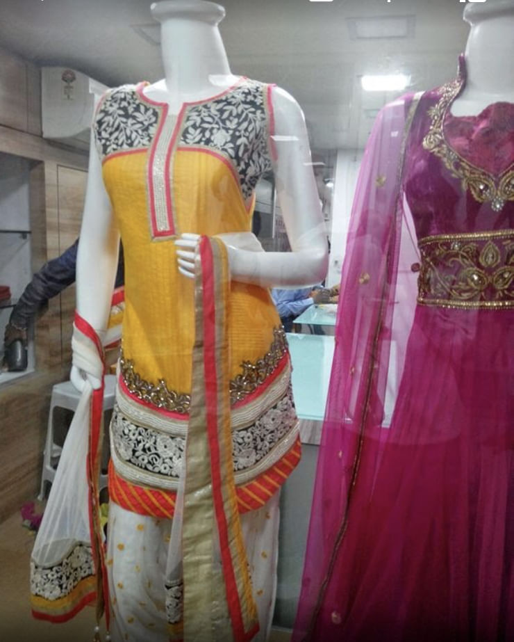 Clothing,White,Yellow,Pink,Dress,Orange,Mannequin,Formal wear,Fashion design,Textile