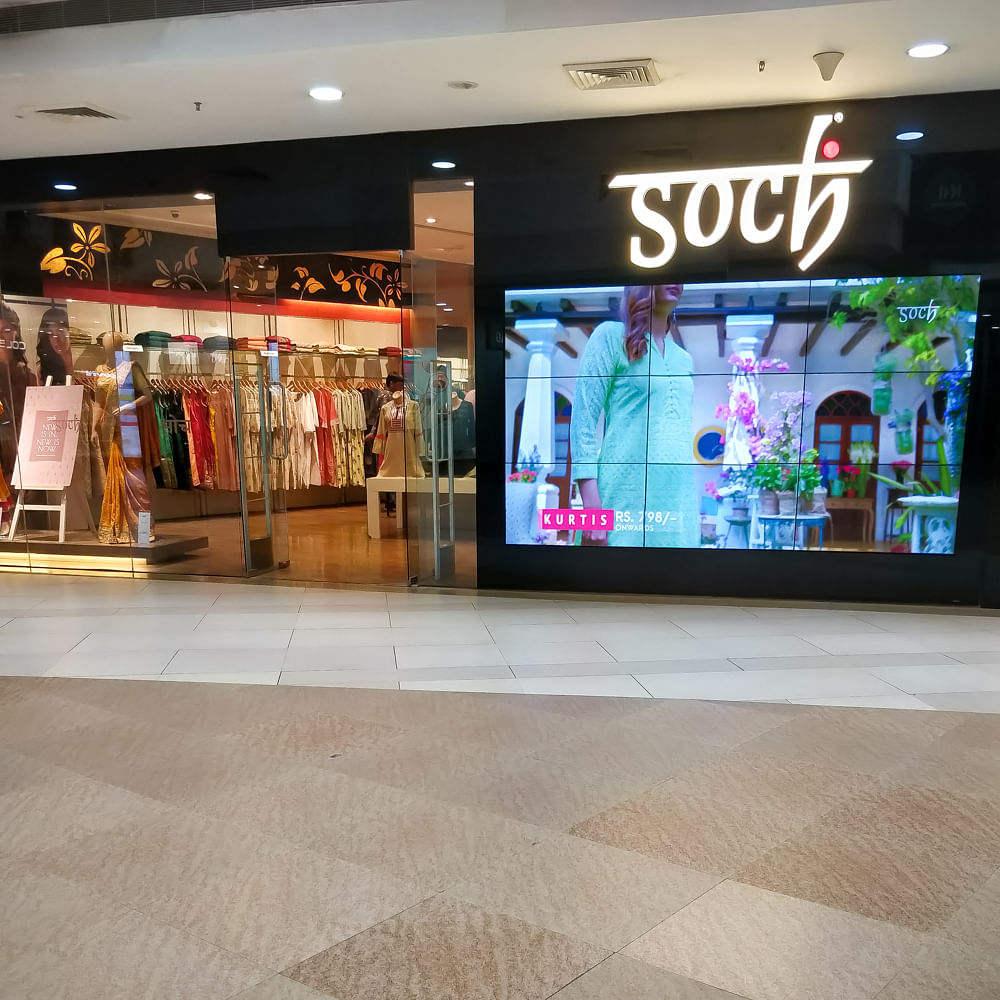 Shopping mall,Building,Beauty,Retail,Outlet store,Footwear,Architecture,Shopping,Floor,Interior design